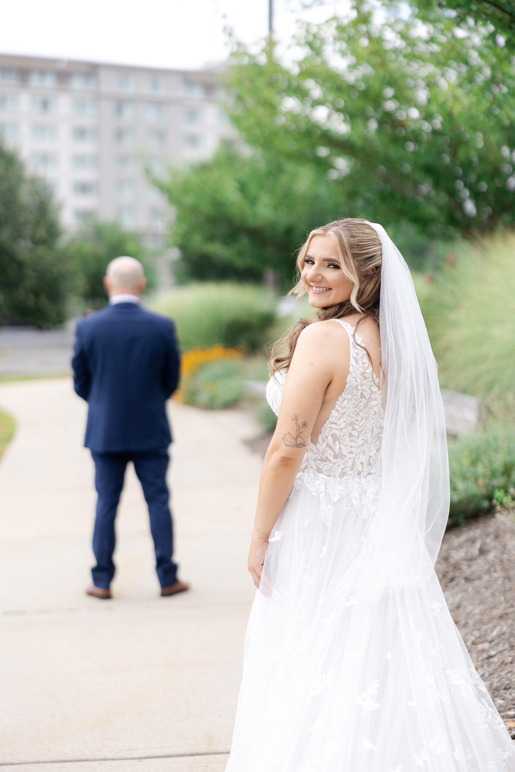 Elegant outdoor first look at Bridgewater Marriott wedding