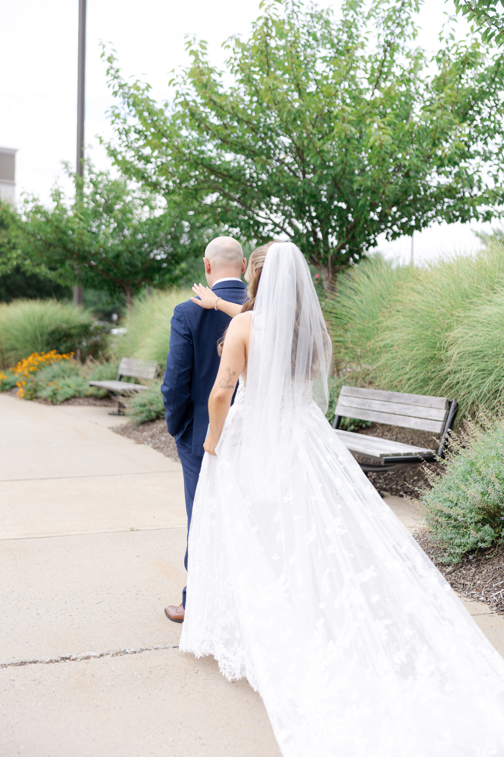 Elegant outdoor first look at Bridgewater Marriott wedding