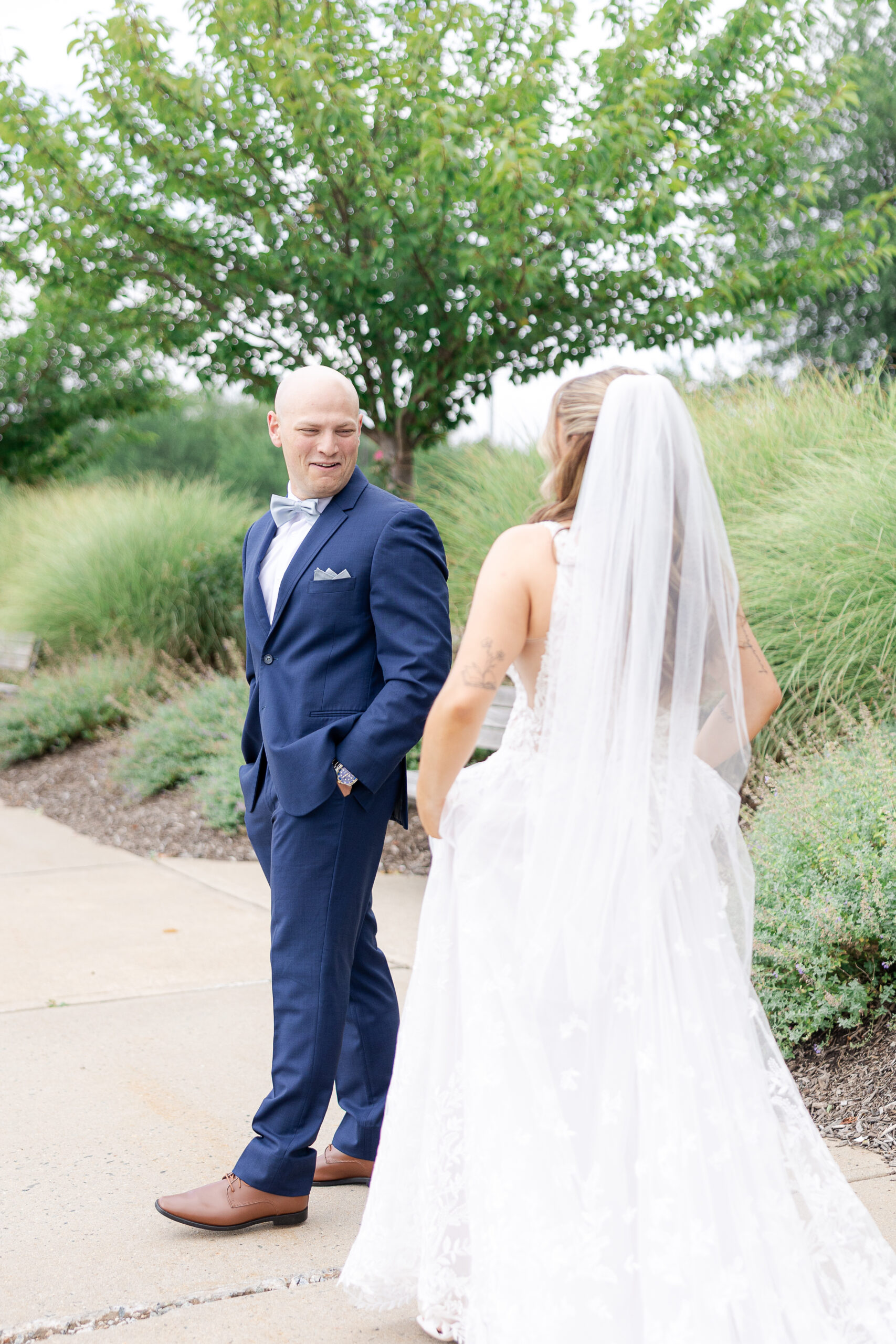 Elegant outdoor first look at Bridgewater Marriott wedding