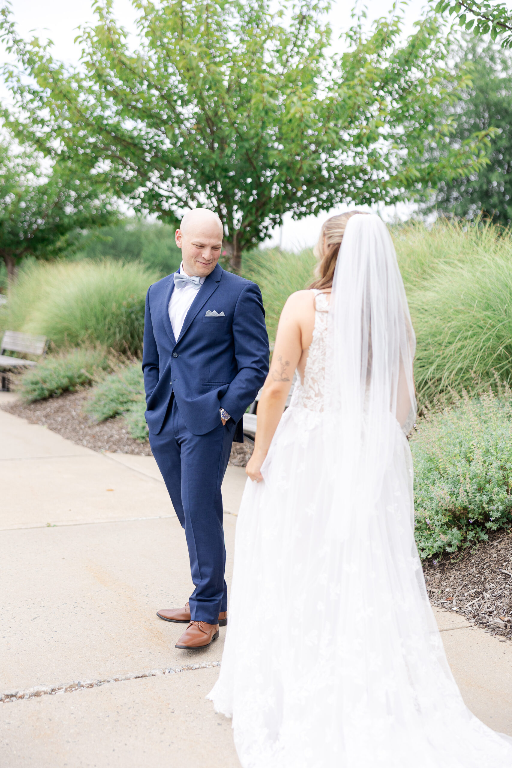Elegant outdoor first look at Bridgewater Marriott wedding