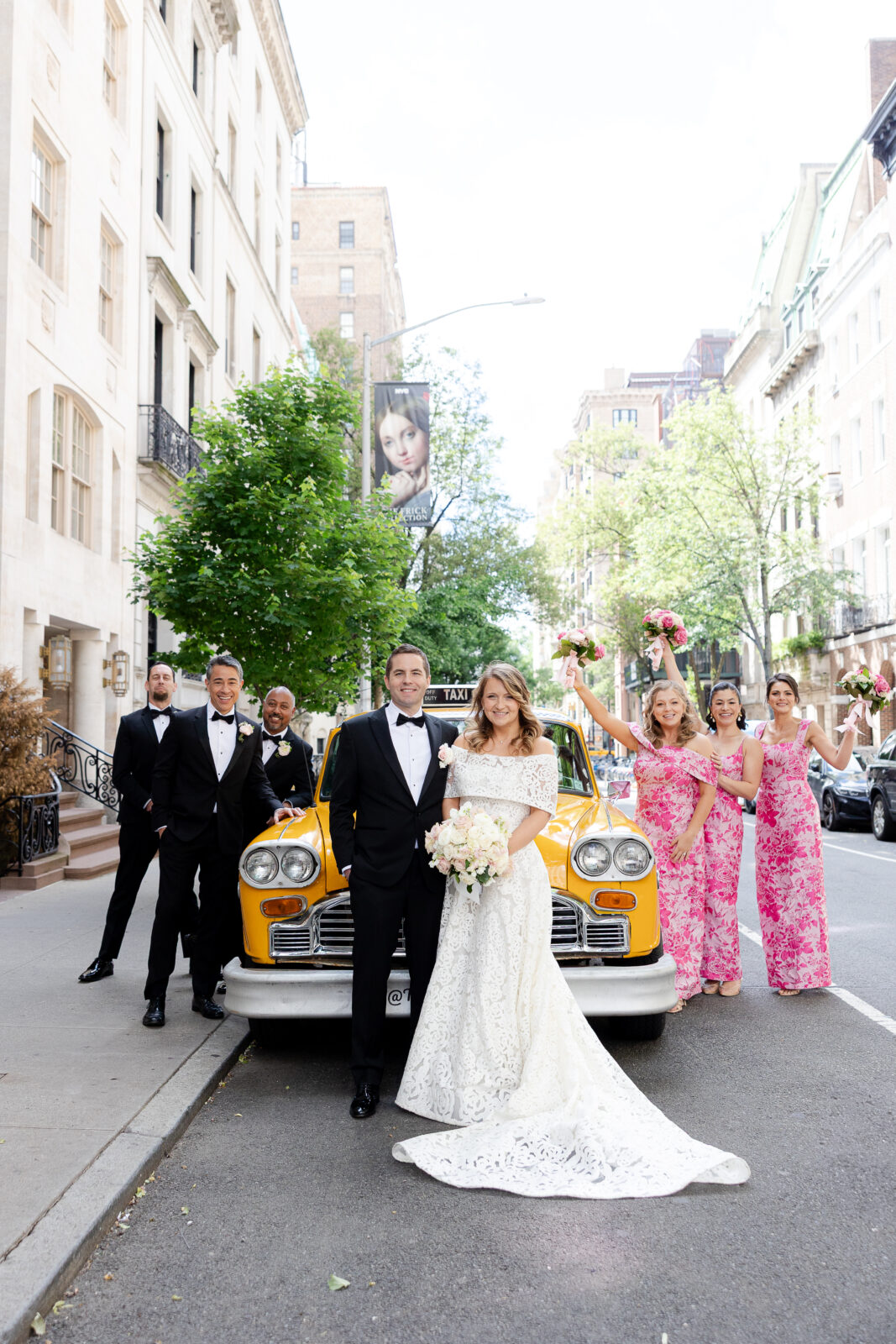 Wedding Party in front of checkered cab