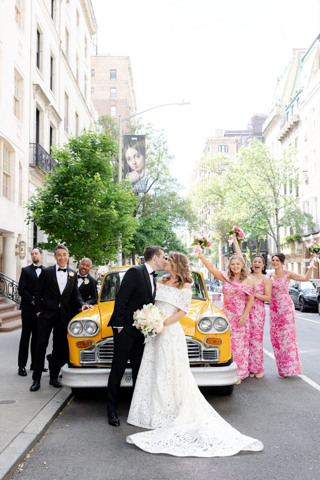 Wedding Party in front of checkered cab