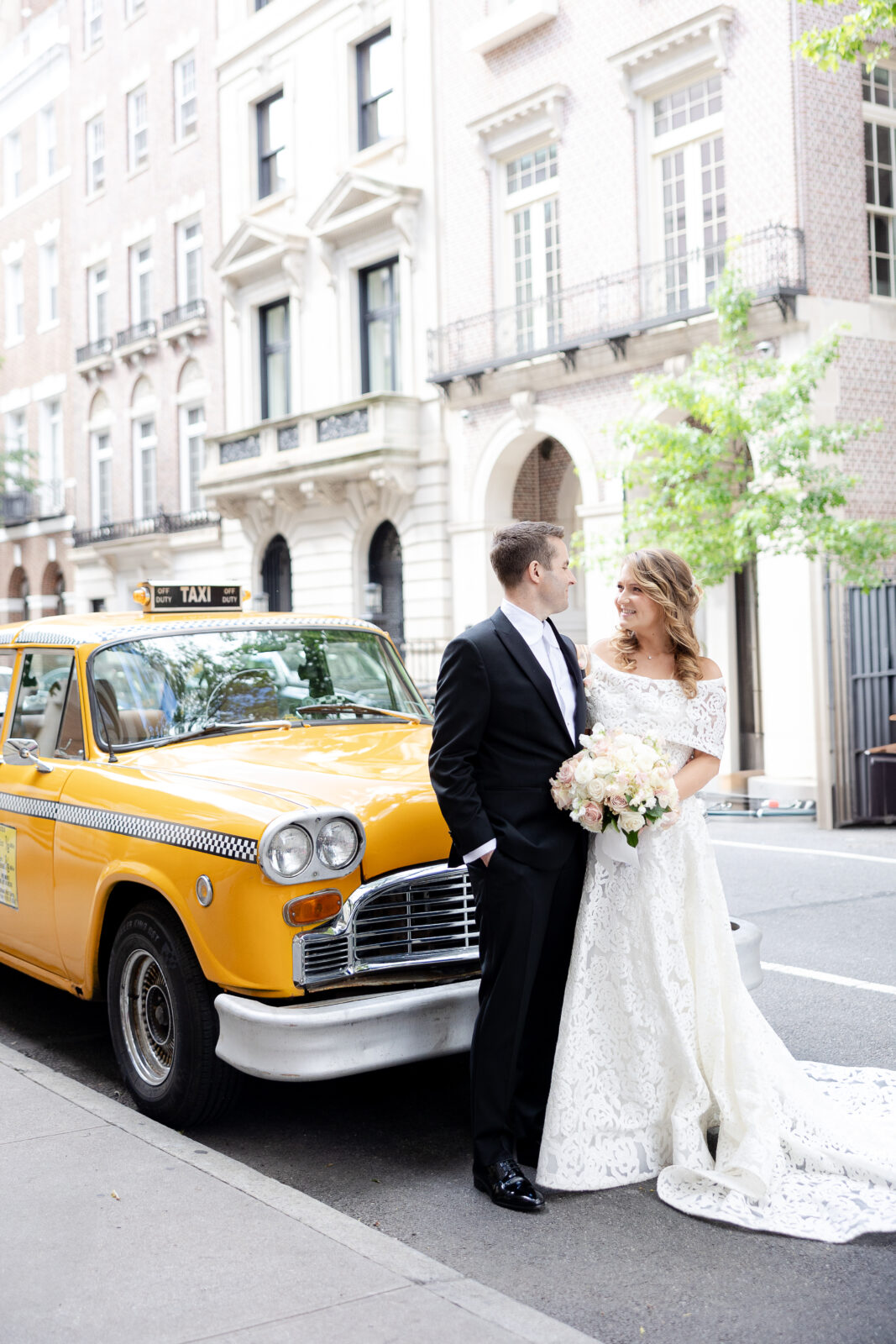 NYC Bride and Groom Wedding Portraits with Checkered Cab