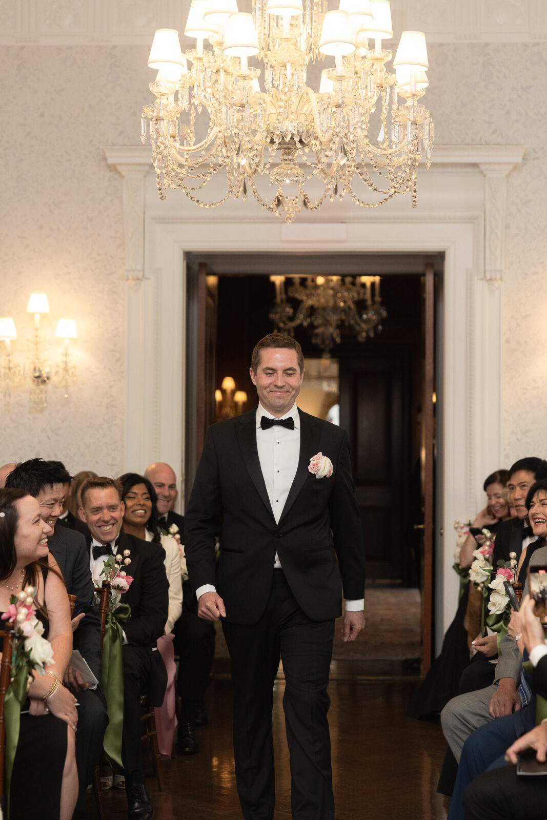 NYC groom walking into wedding ceremony