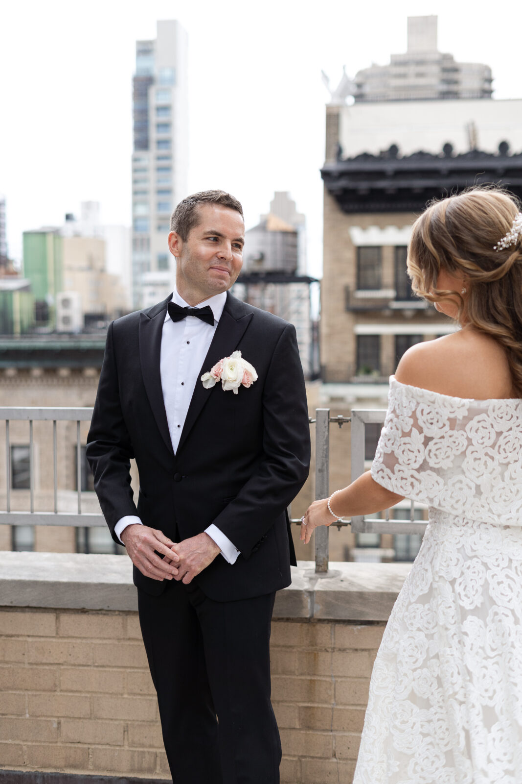 Bride and groom first look at Loews Regency Hotel