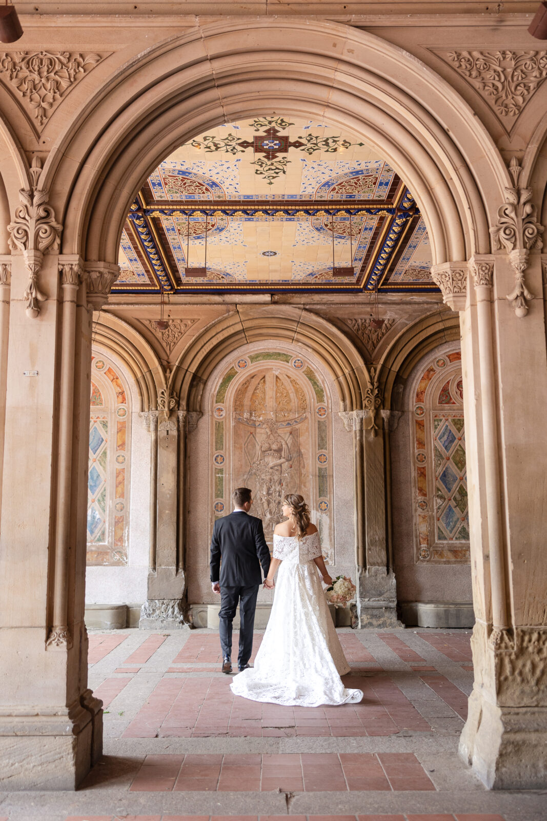 Bride and groom portraits at Bethesda Terrace Central Park