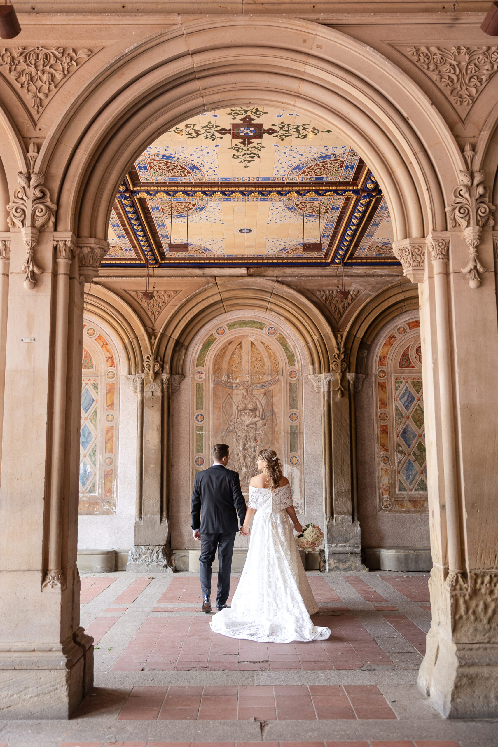 Bride and groom portraits at Bethesda Terrace Central Park