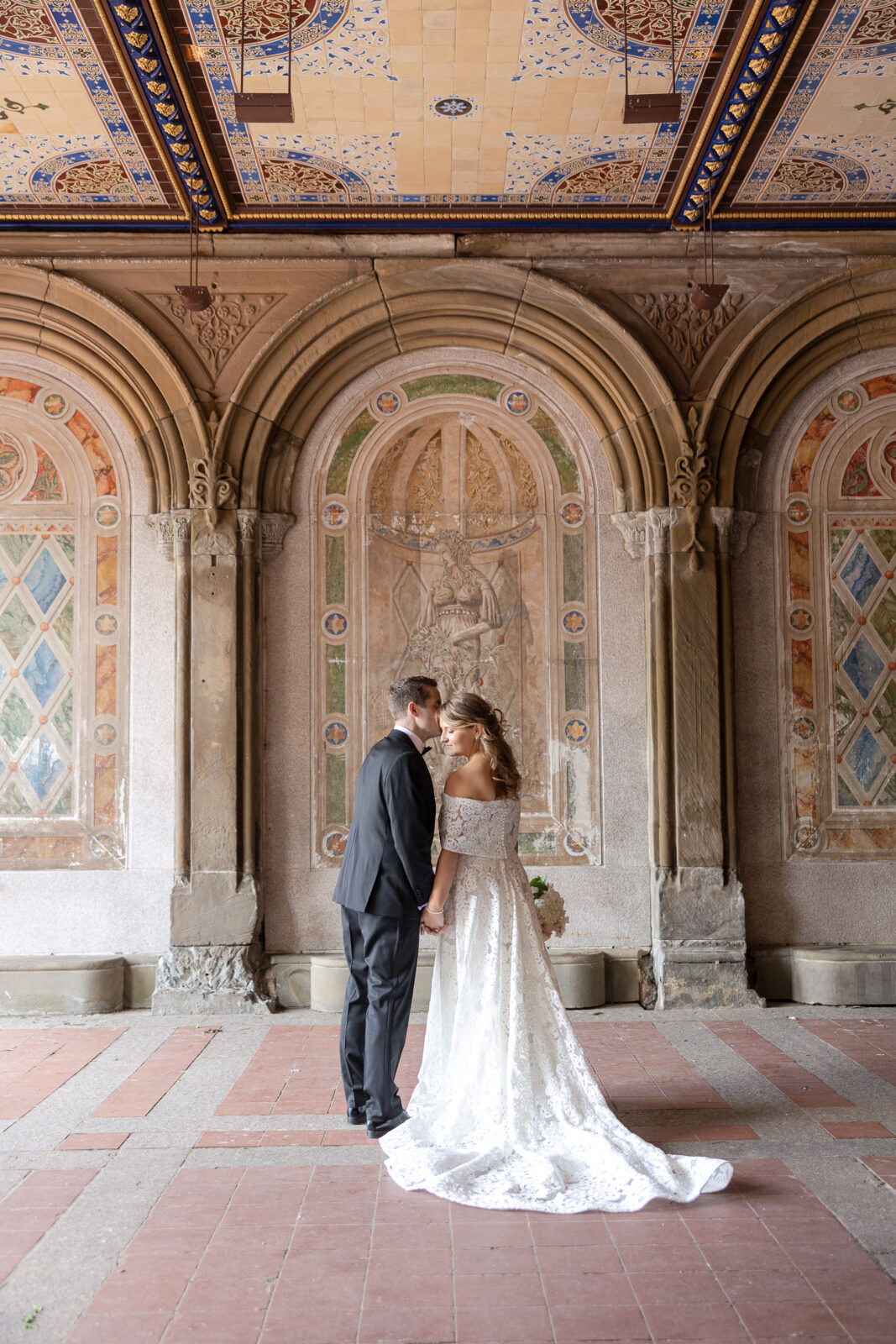 Bride and groom portraits at Bethesda Terrace Central Park