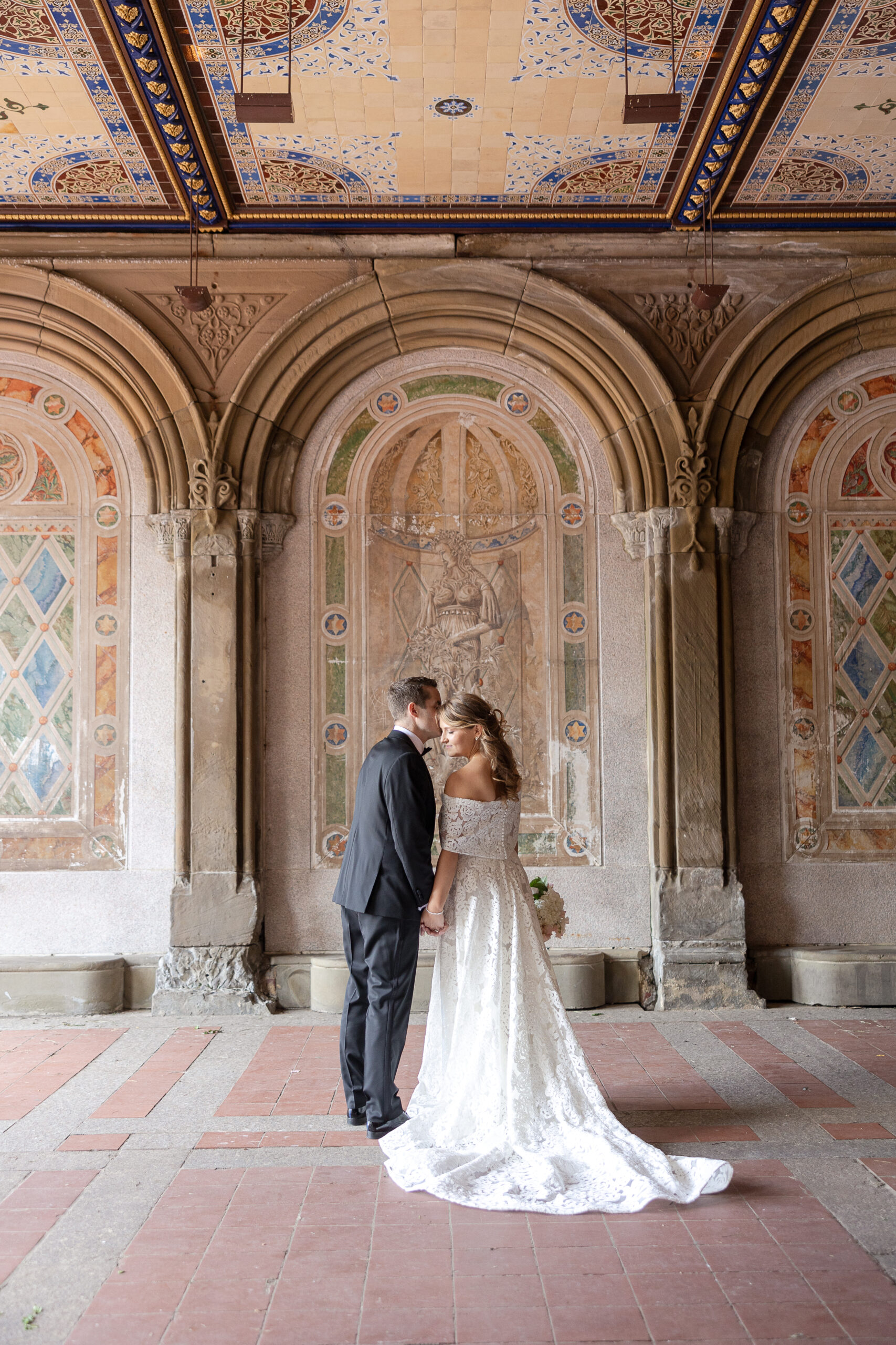 Bride and groom portraits at Bethesda Terrace Central Park