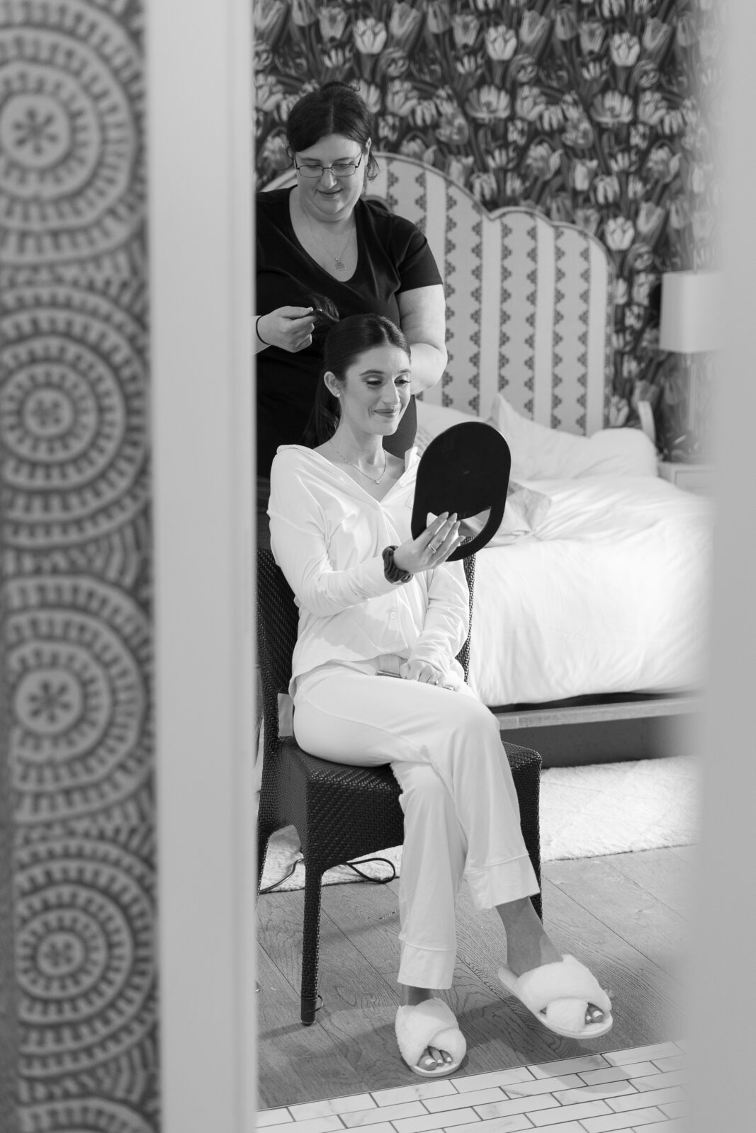 Bride getting hair and make up done