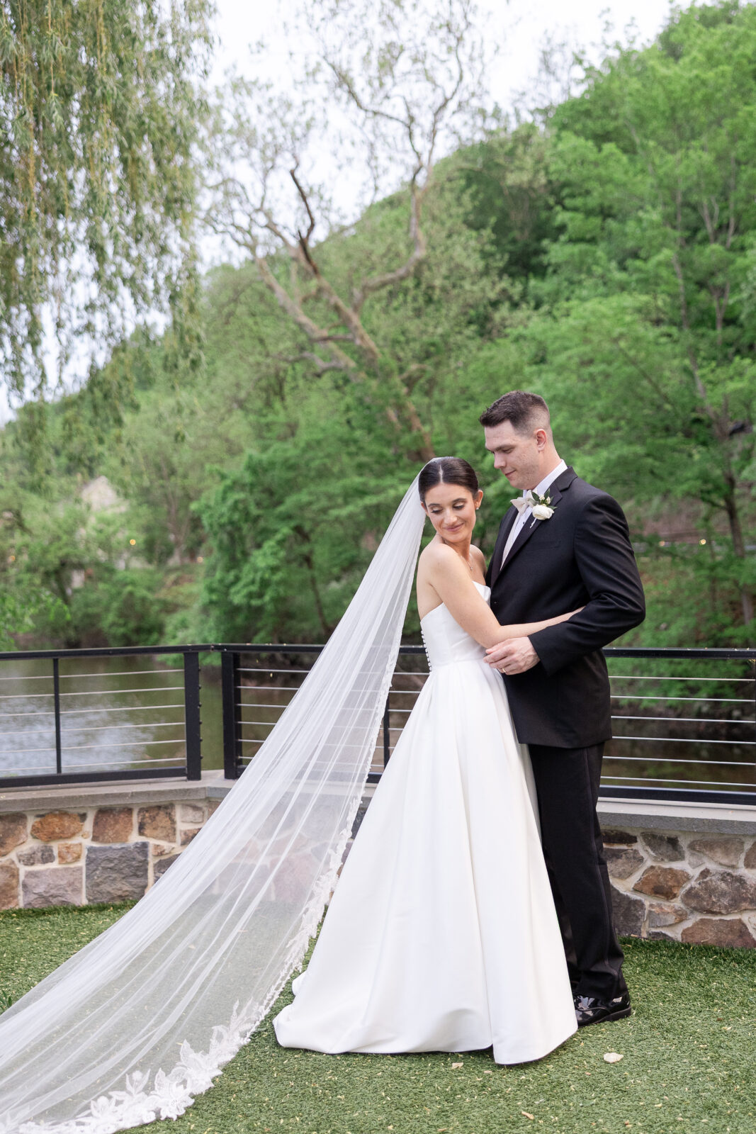 Bride and groom portraits along River House waterfront