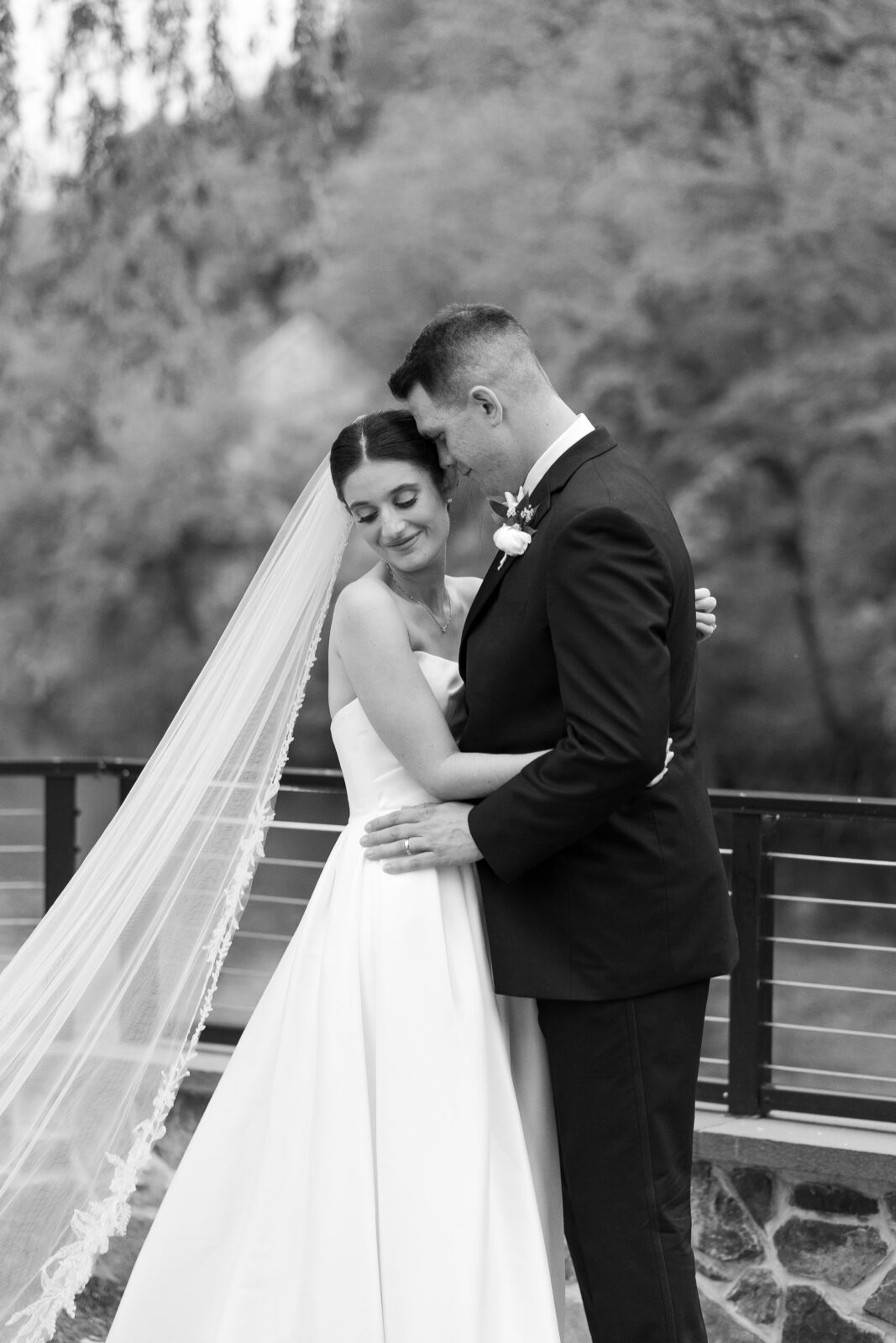 Bride and groom portraits along River House waterfront