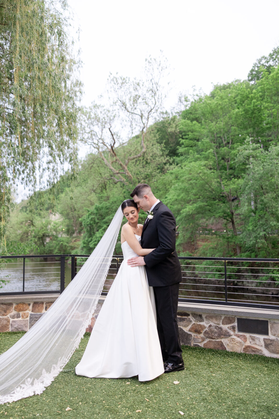 Romantic sunset wedding photos at River House at Odette’s