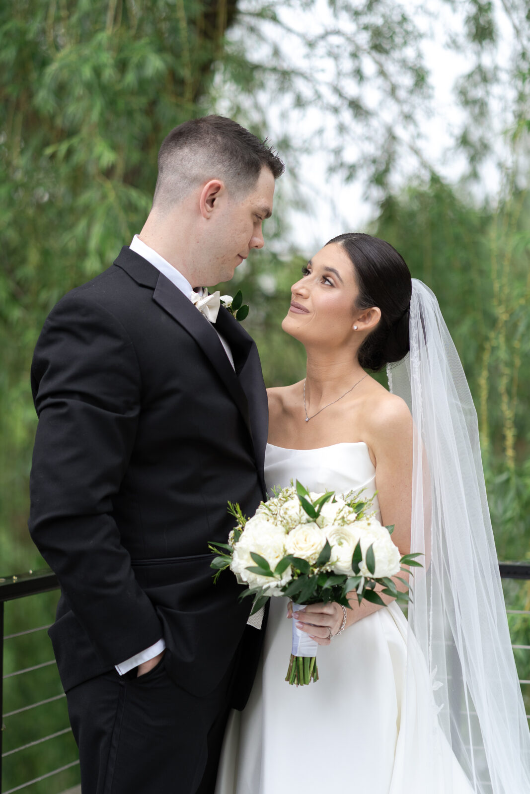 Bride and groom along the Delaware River waterfront
