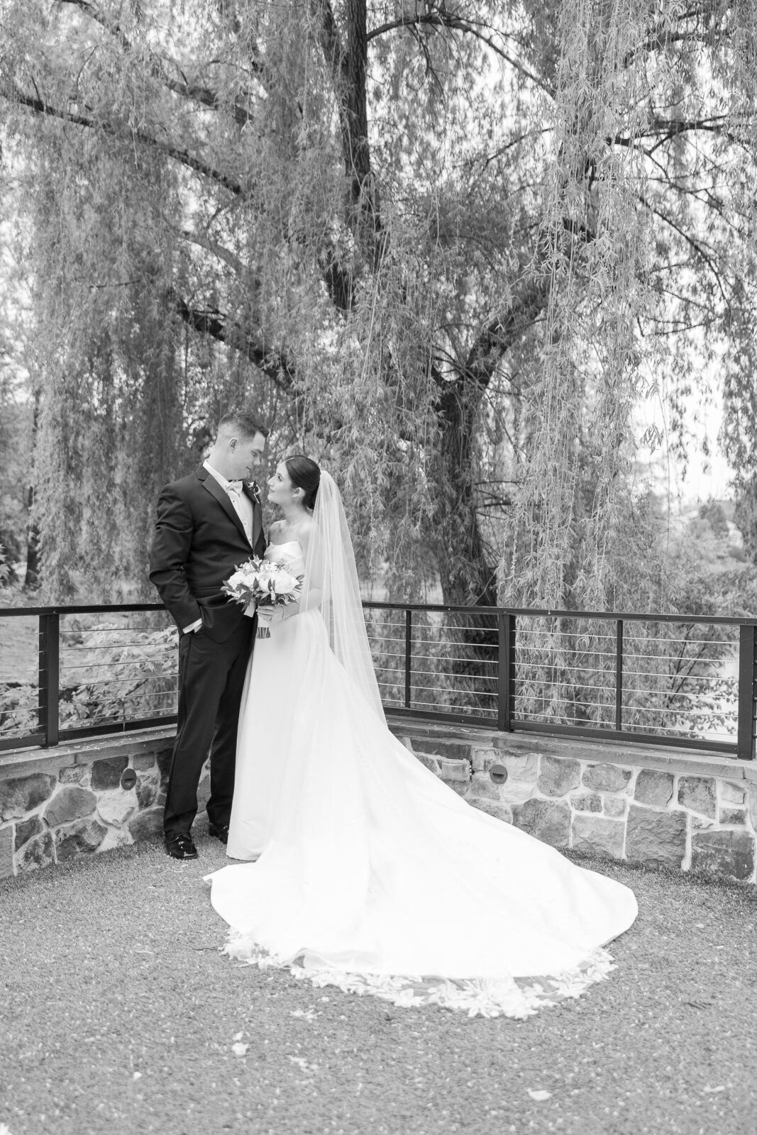 Bride and groom along the Delaware River waterfront