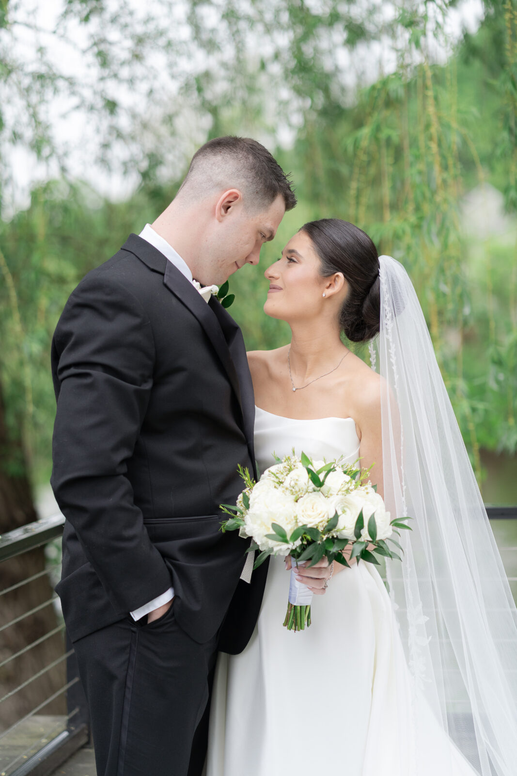 Bride and groom along the Delaware River waterfront