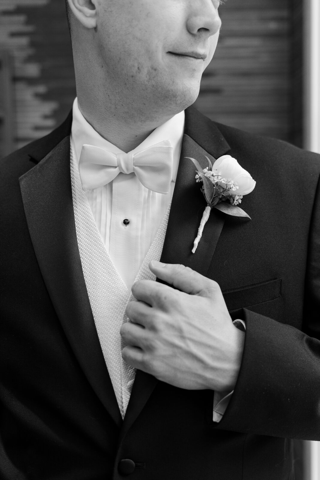 Groom getting dressed