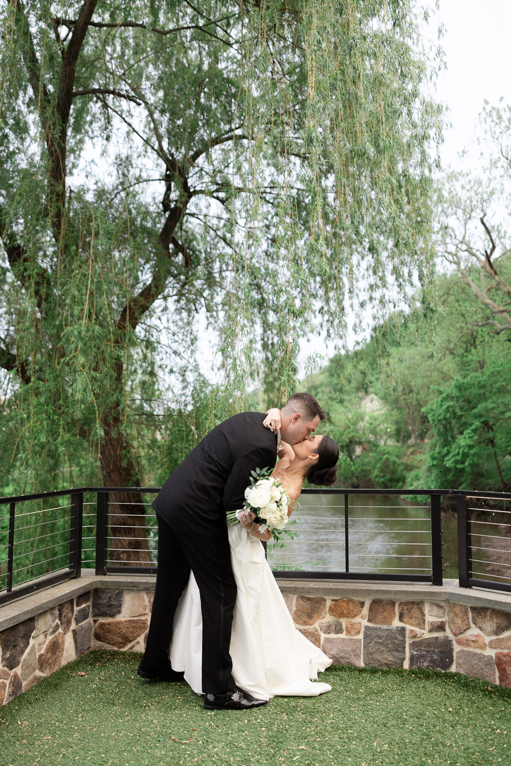 Elegant couple portraits at River House at Odette’s wedding venue