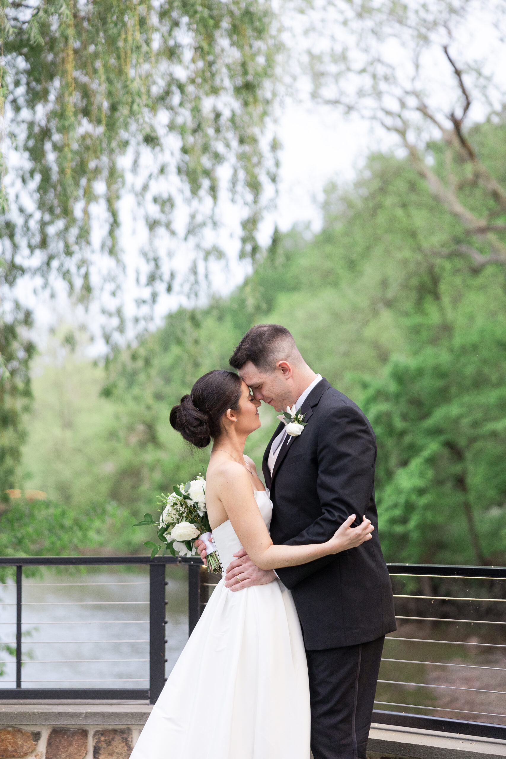 Romantic waterfront wedding portraits in New Hope Pennsylvania