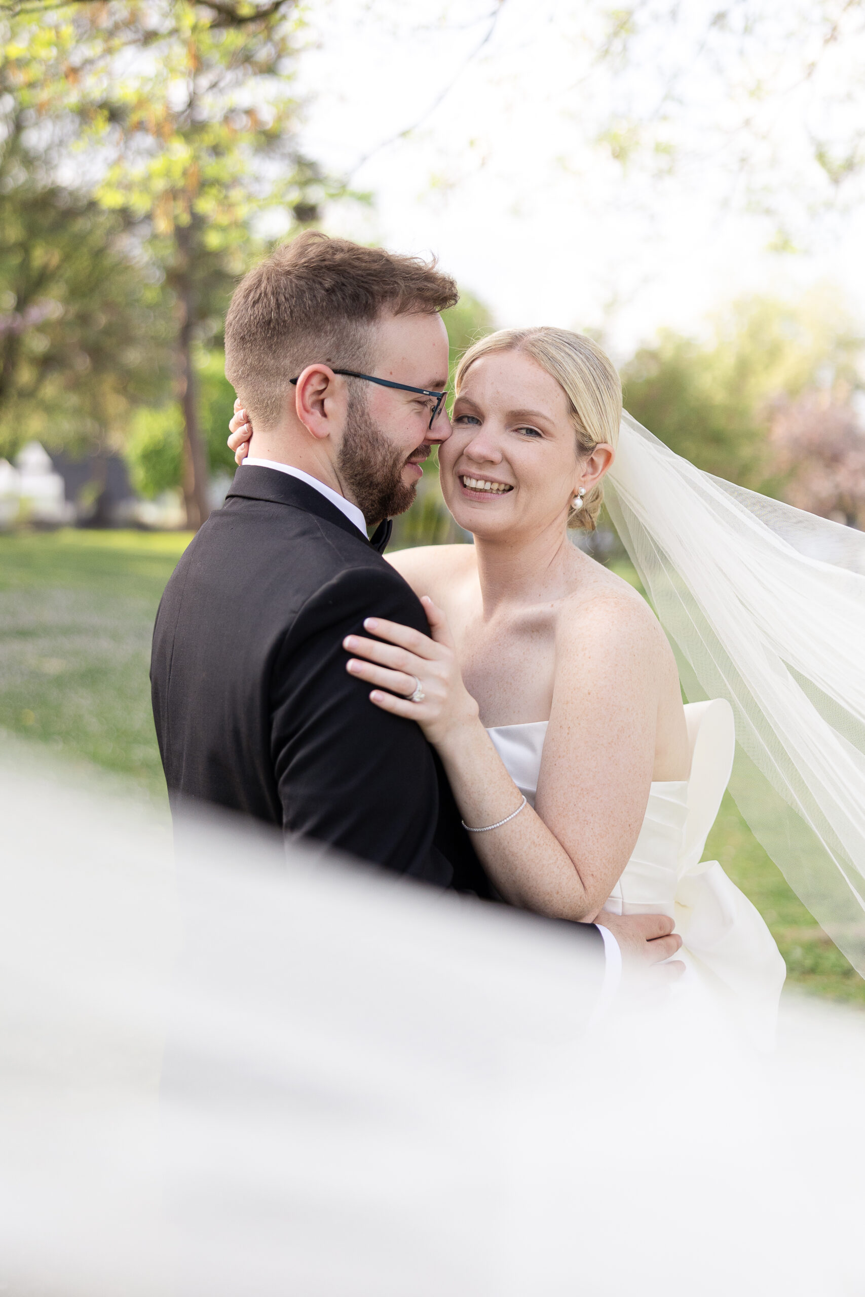 Bride and groom spring cherry blossoms wedding portraits at VIP Country Club Wedding