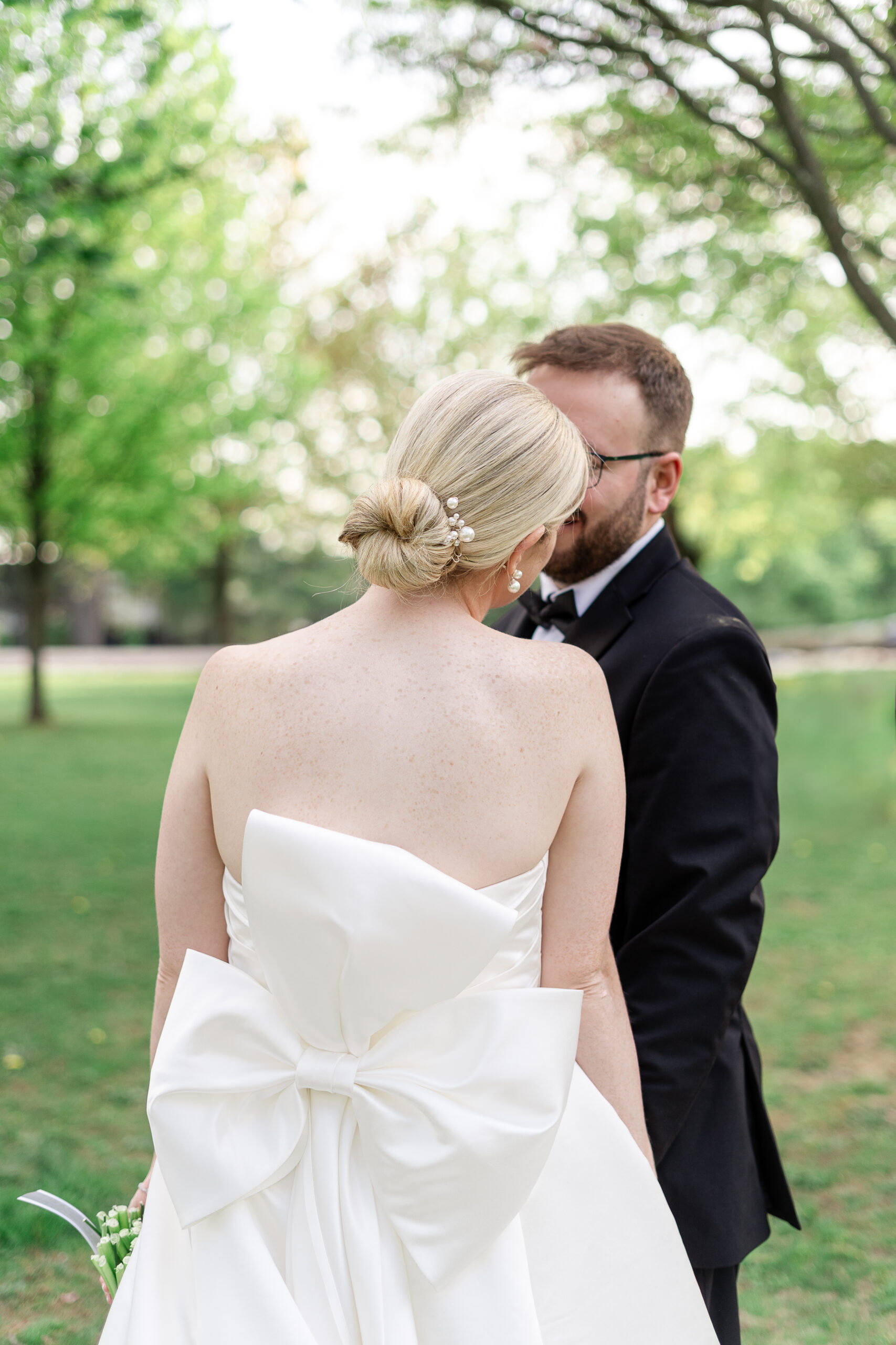 Candid moments at wedding portraits at VIP Country Club Wedding