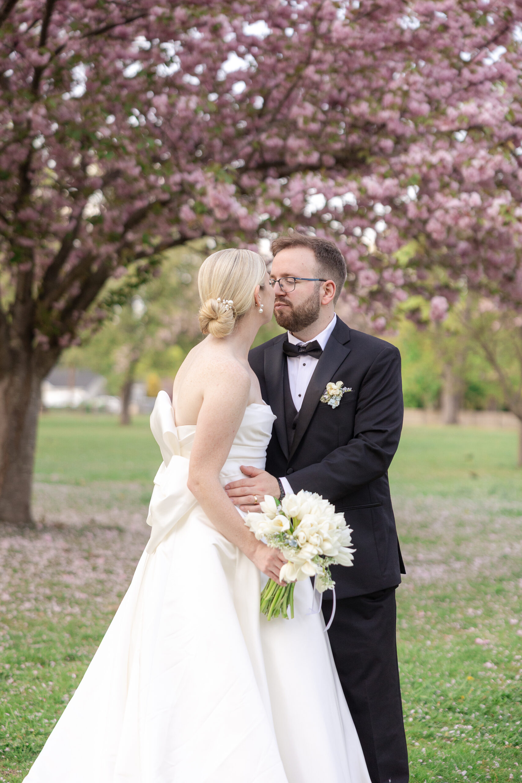 Bride and groom spring cherry blossoms wedding portraits at VIP Country Club Wedding