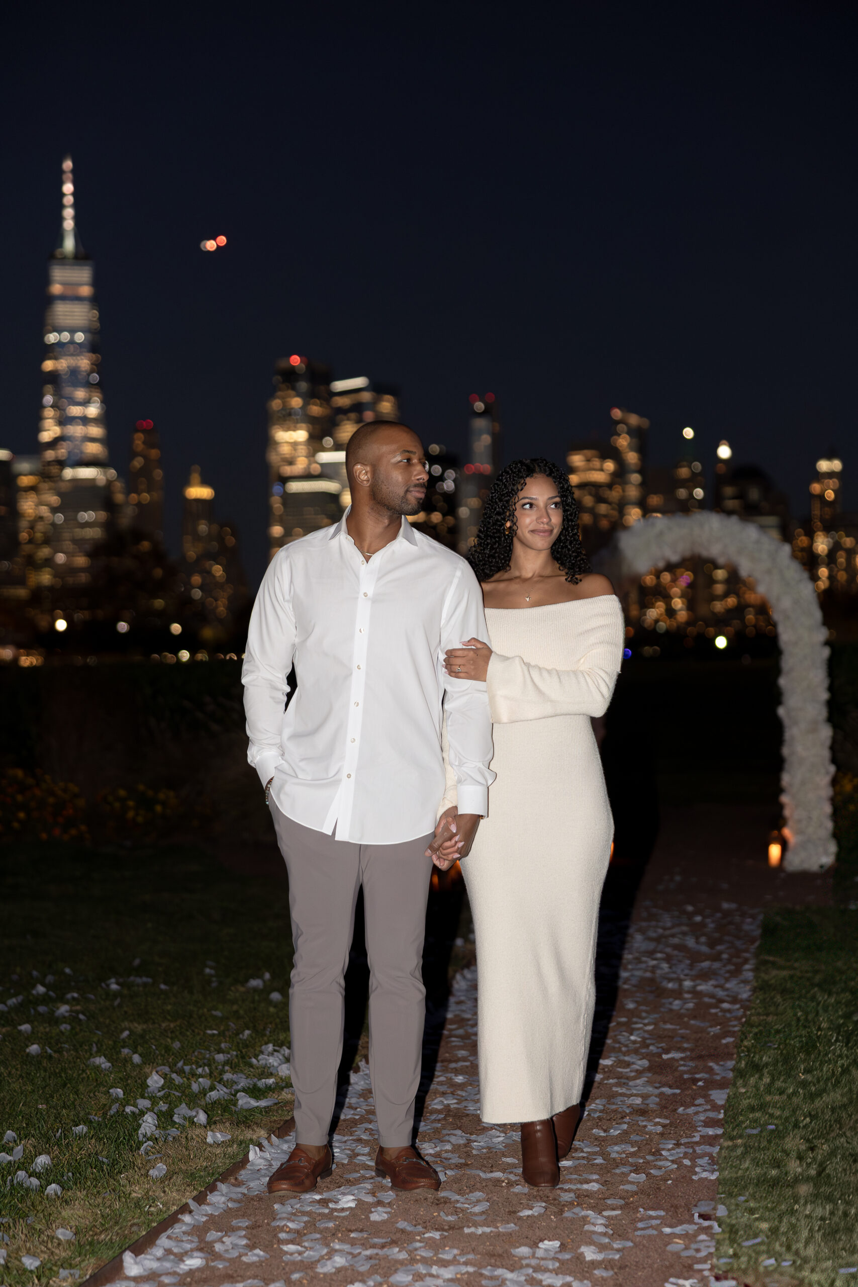 Liberty State Park engagement session with fall evening light and skyline views