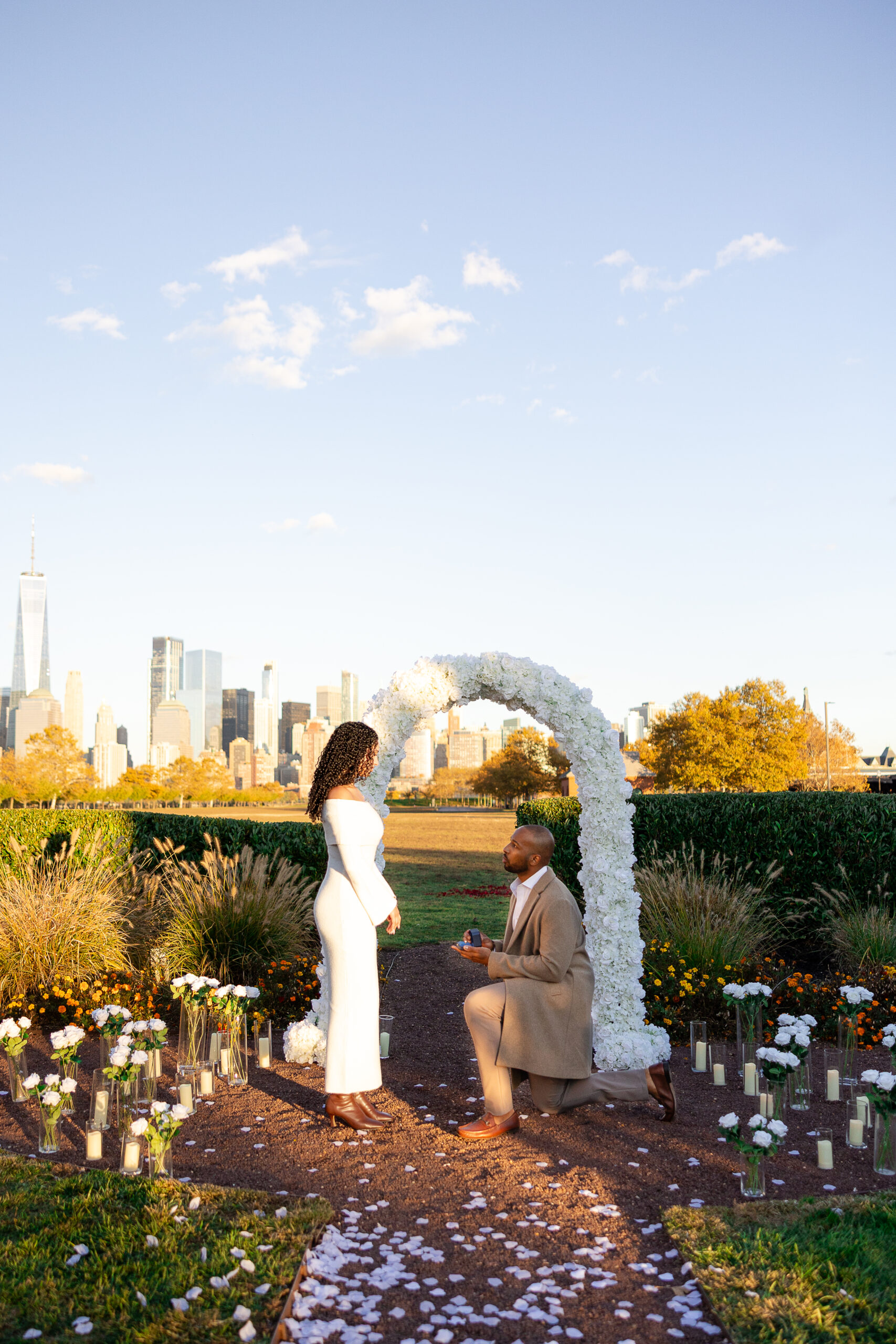 Jersey City proposal photographer capturing the moment he gets on one knee at Maddy Rose Restaurant