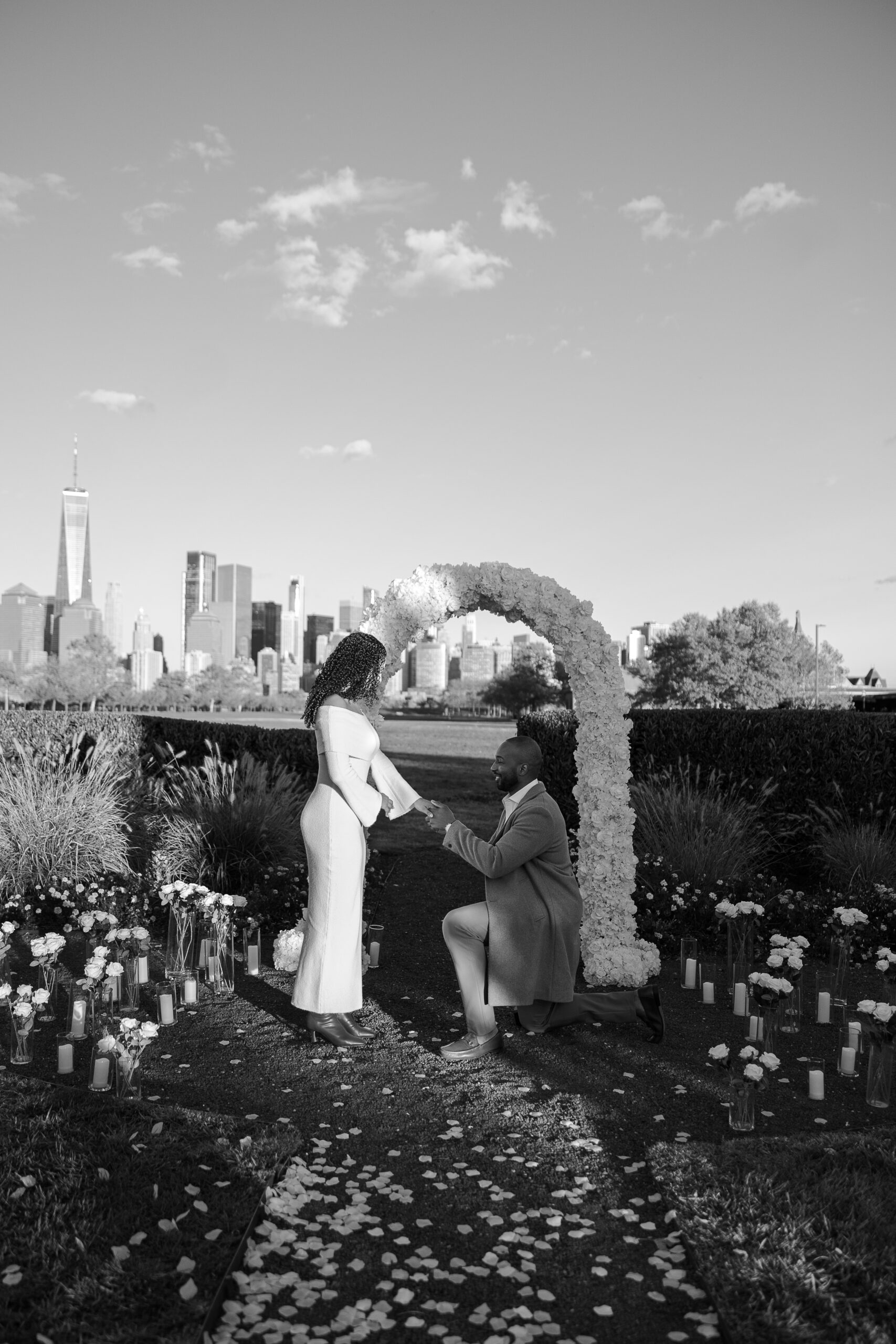 Jersey City proposal photographer capturing the moment he gets on one knee at Maddy Rose Restaurant