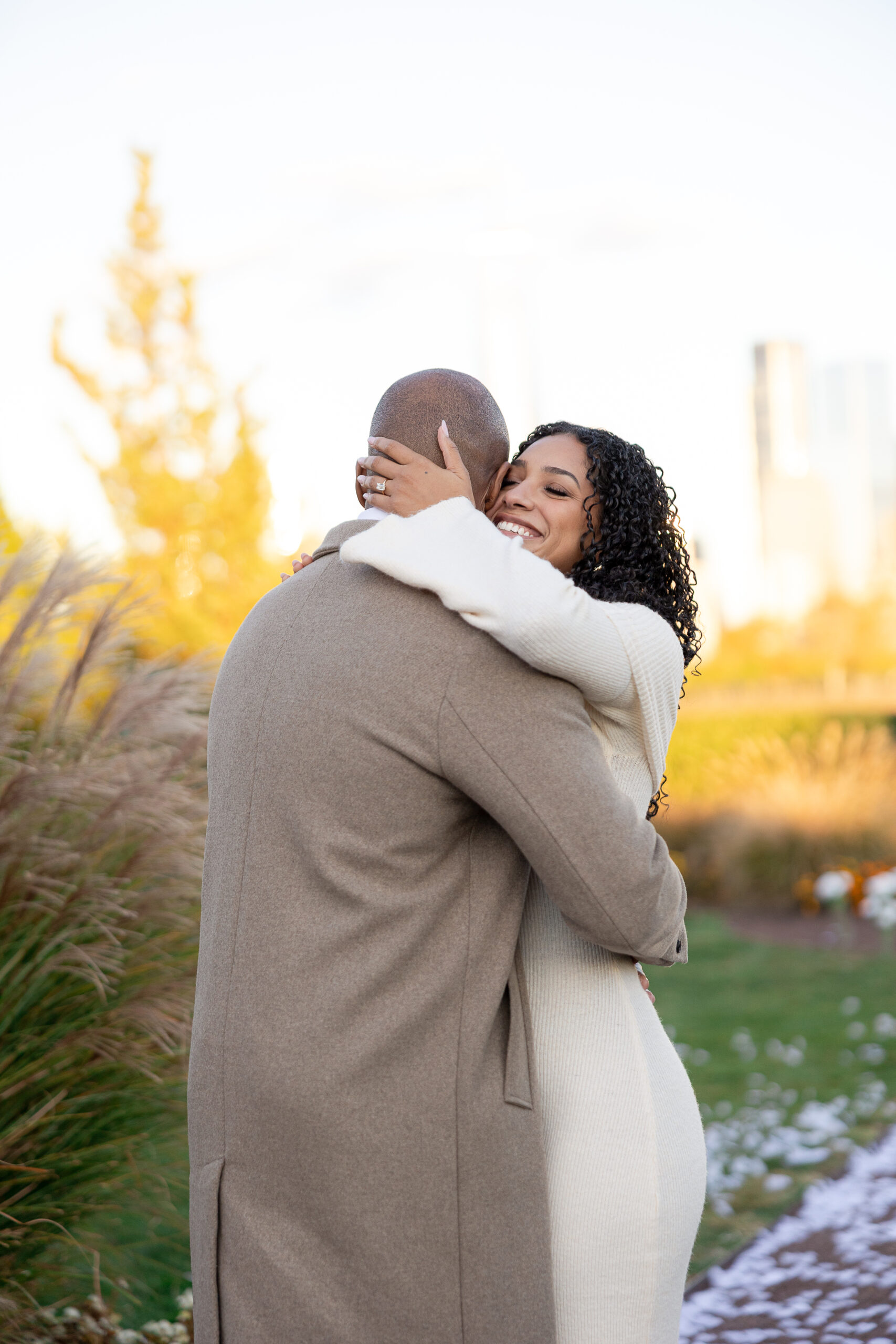 Emotional reaction after a surprise proposal in Maddy Rose Restaurant