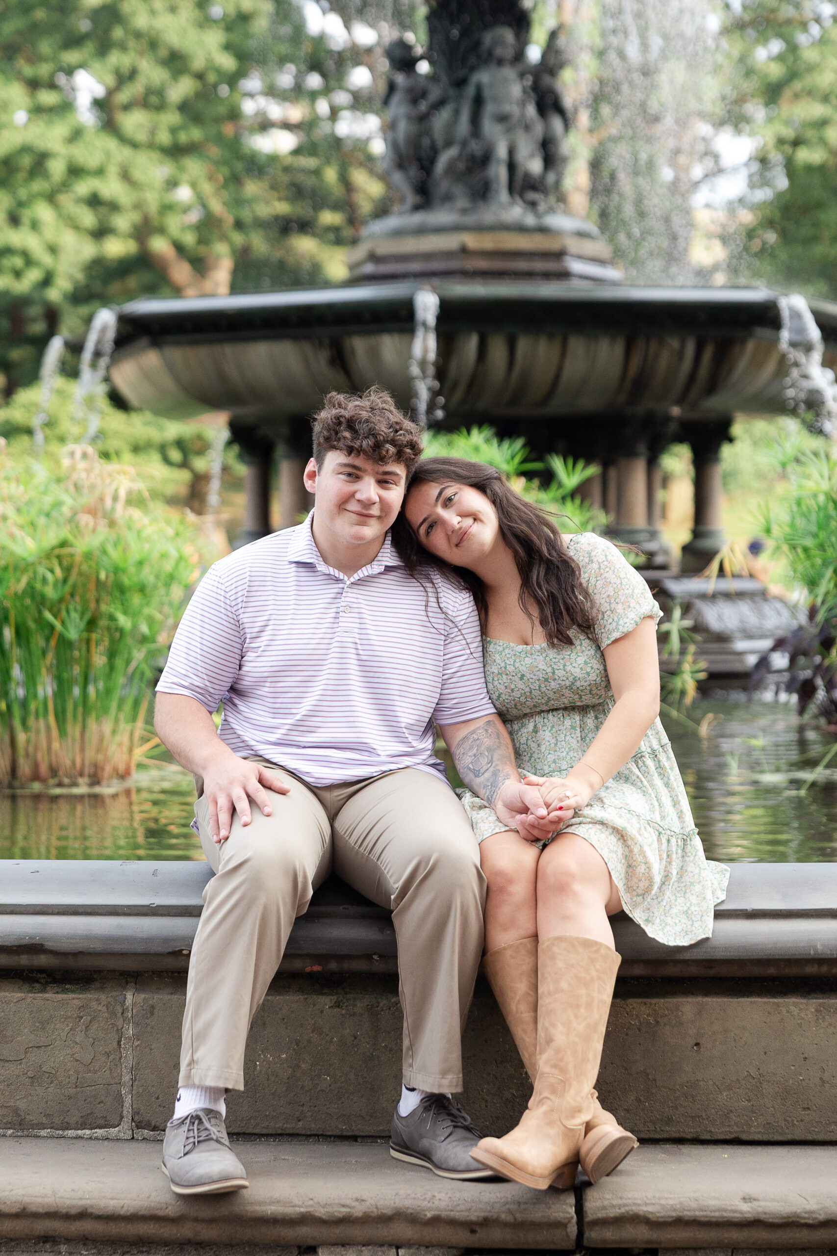 Just engaged couple in front of Bethesda Fountain
