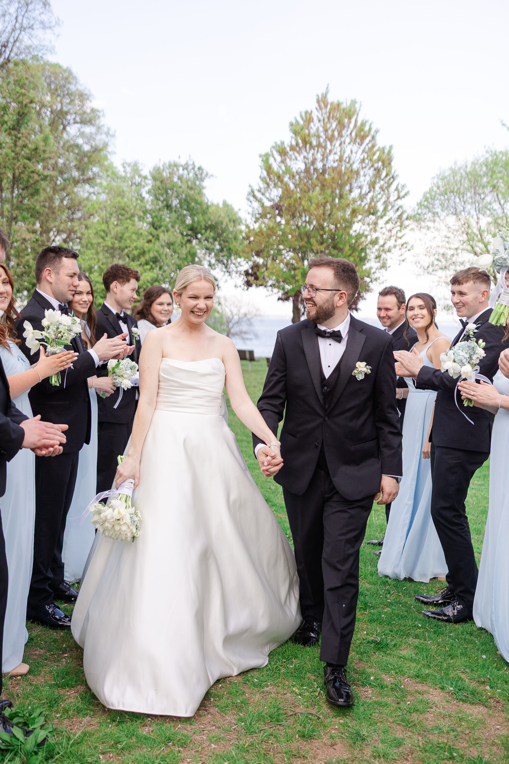 Bride and groom with wedding party at Westchester County