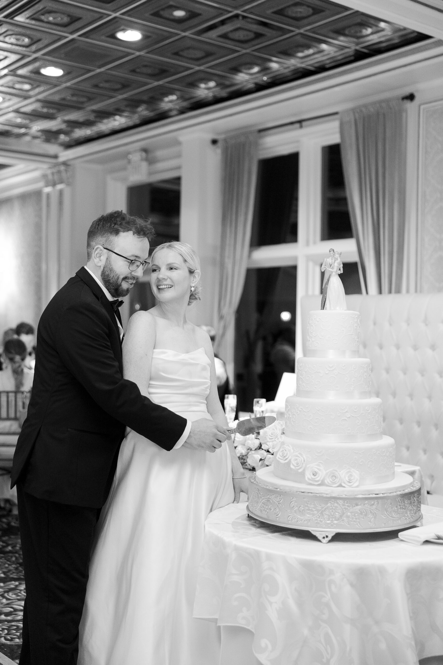 VIP Country Club wedding reception cake cutting with bride and groom
