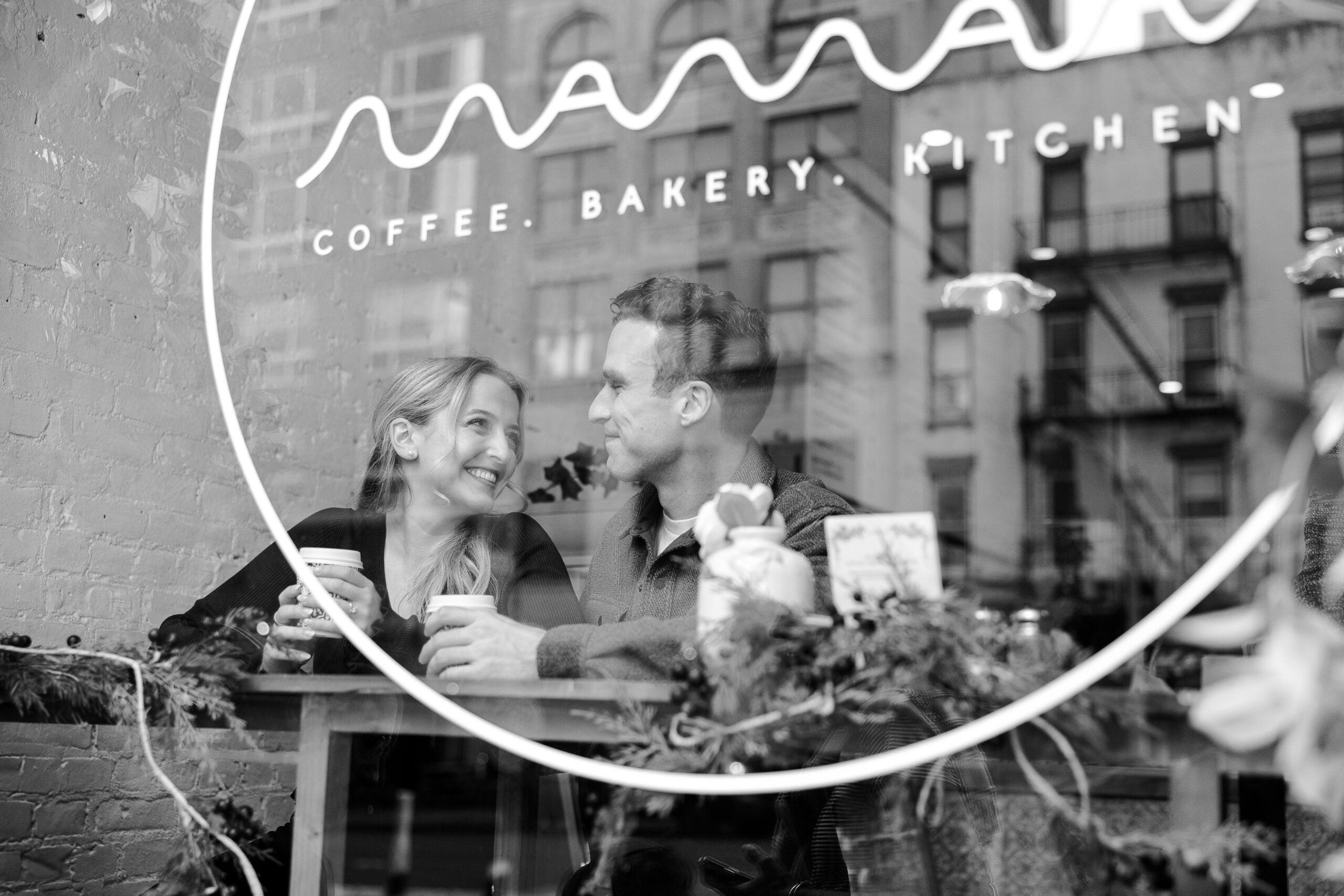 UES engagement portraits at Maman Cafe