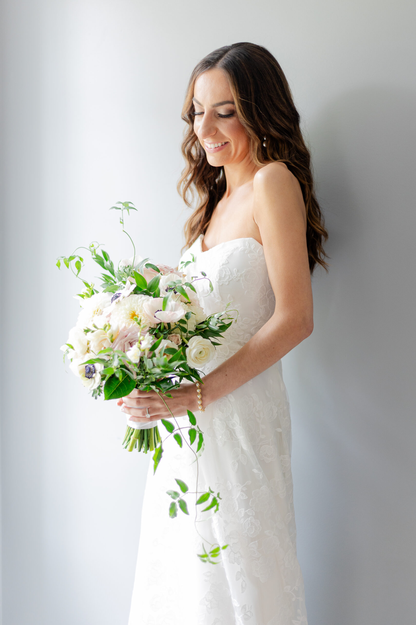 NJ Bride holding stunning wedding bouquet
