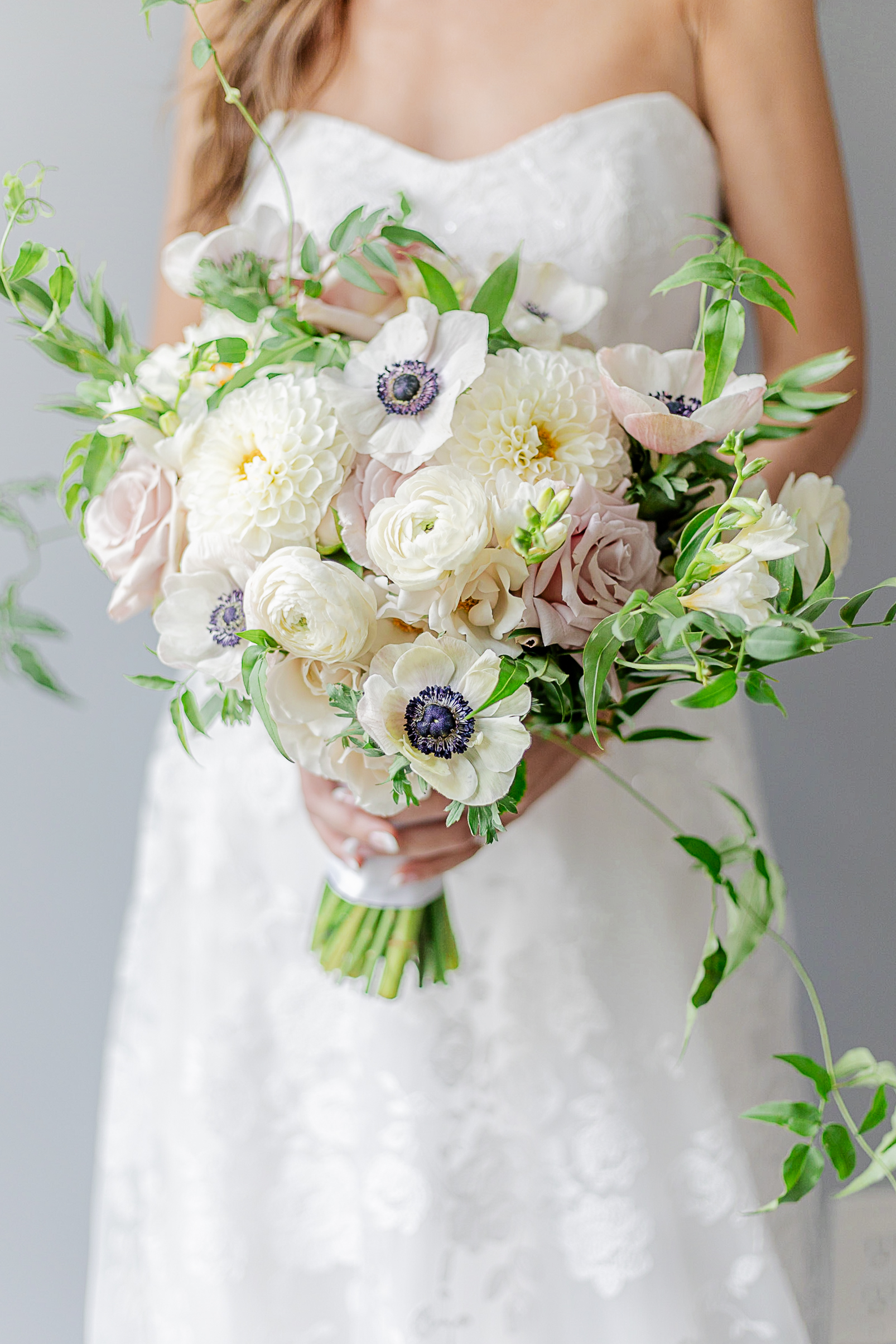 NJ Bride holding stunning wedding bouquet