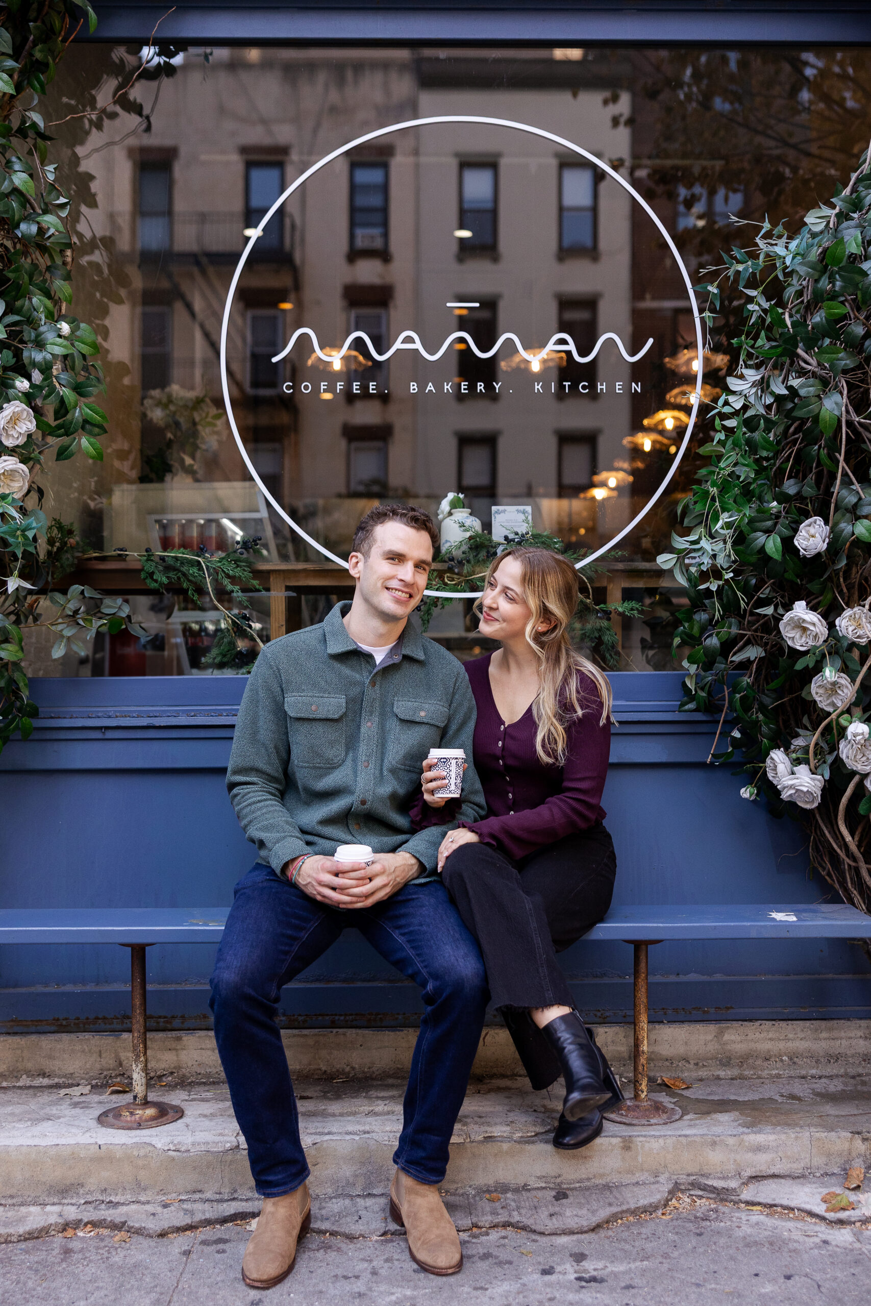 UES engagement couple portraits in front of Maman Cafe