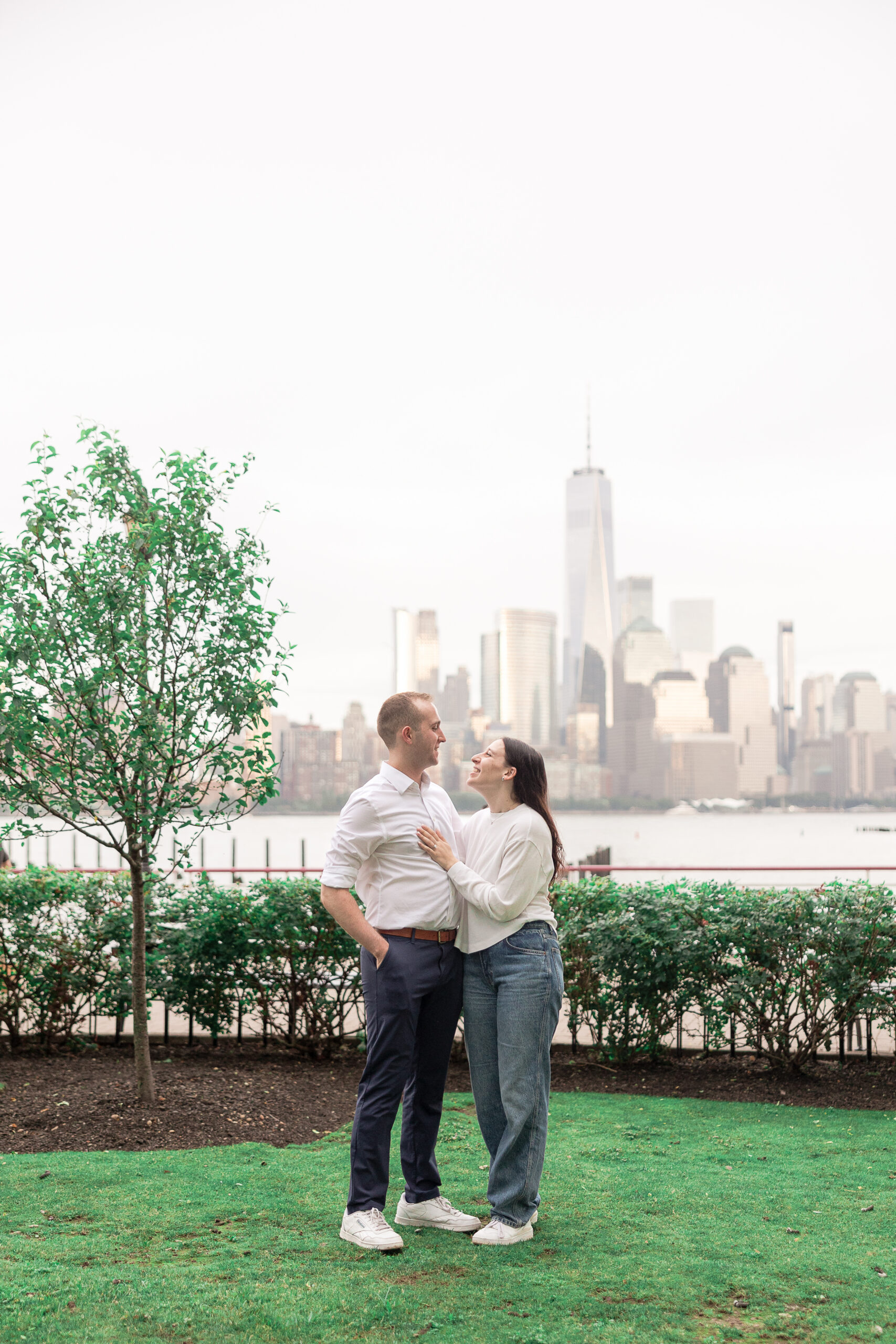 Engagement session with NYC backdrop at Jersey City