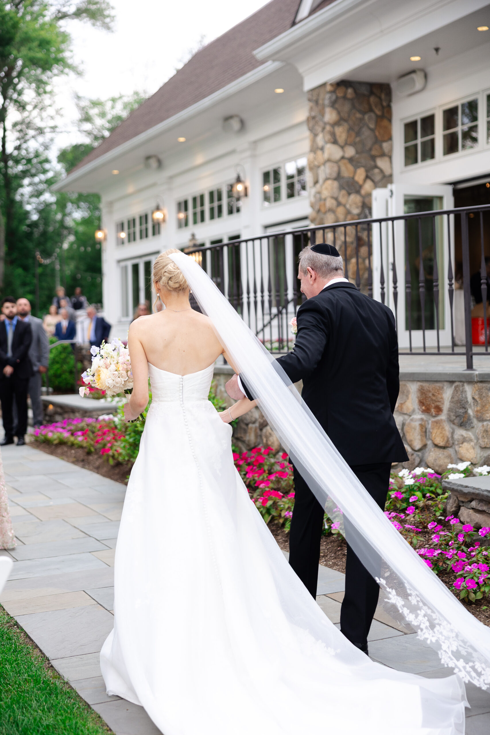 NJ Bride walking down the aisle during wedding ceremony
