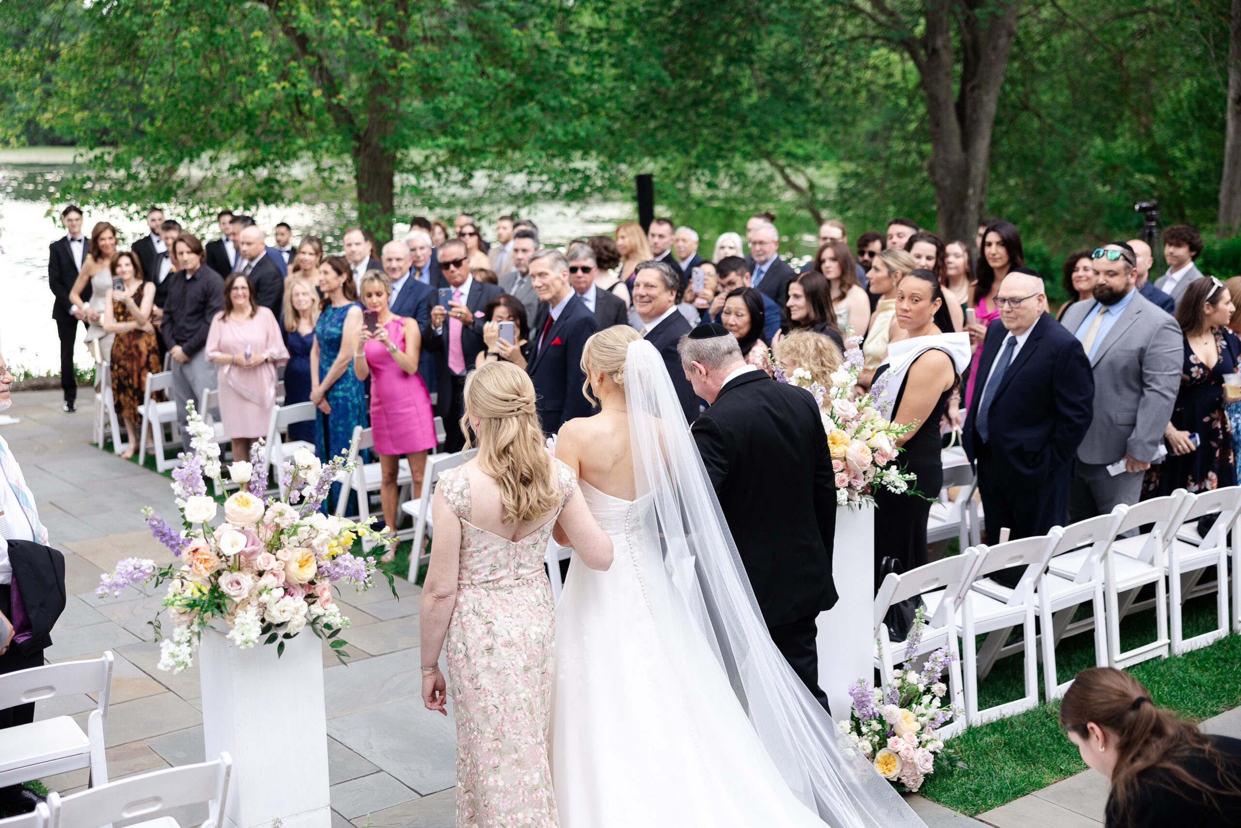 NJ Bride walking down the aisle during wedding ceremony