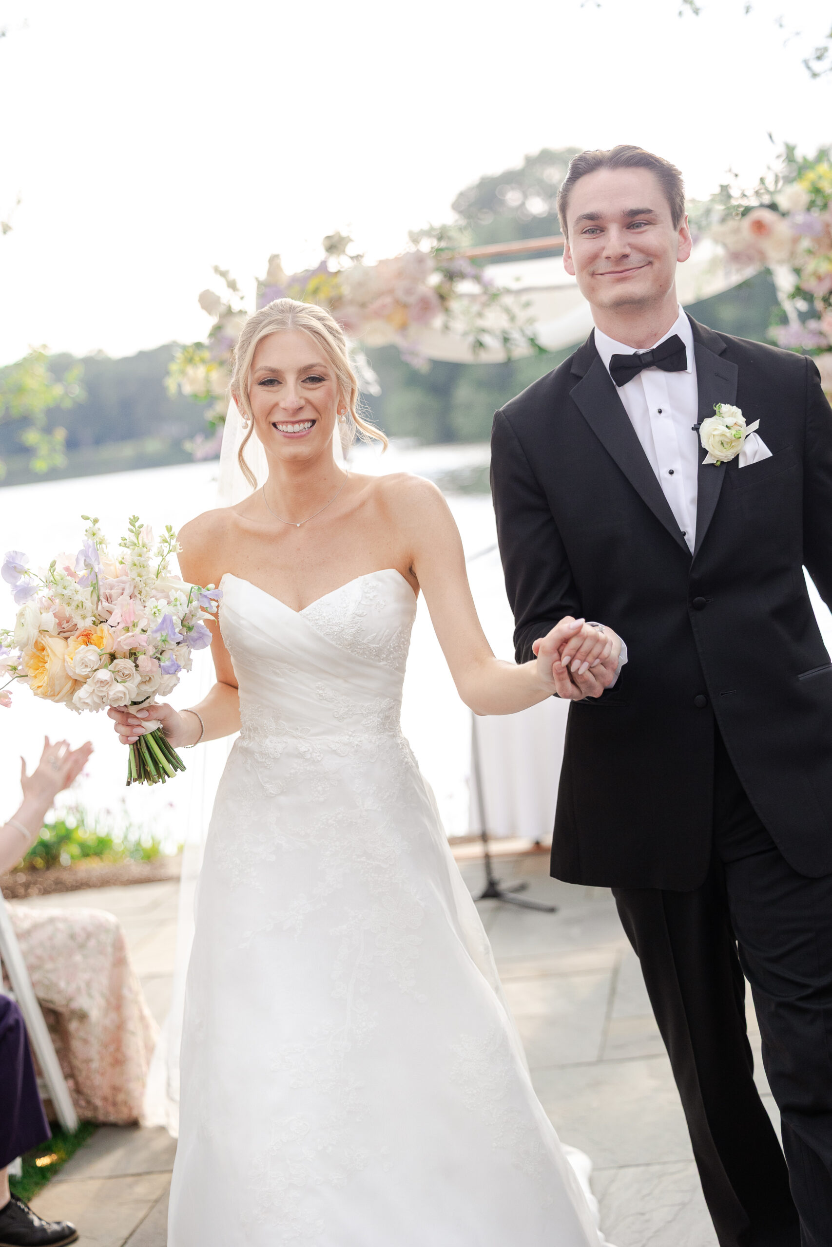 Bride and groom walking down aisle at NJ wedding ceremony