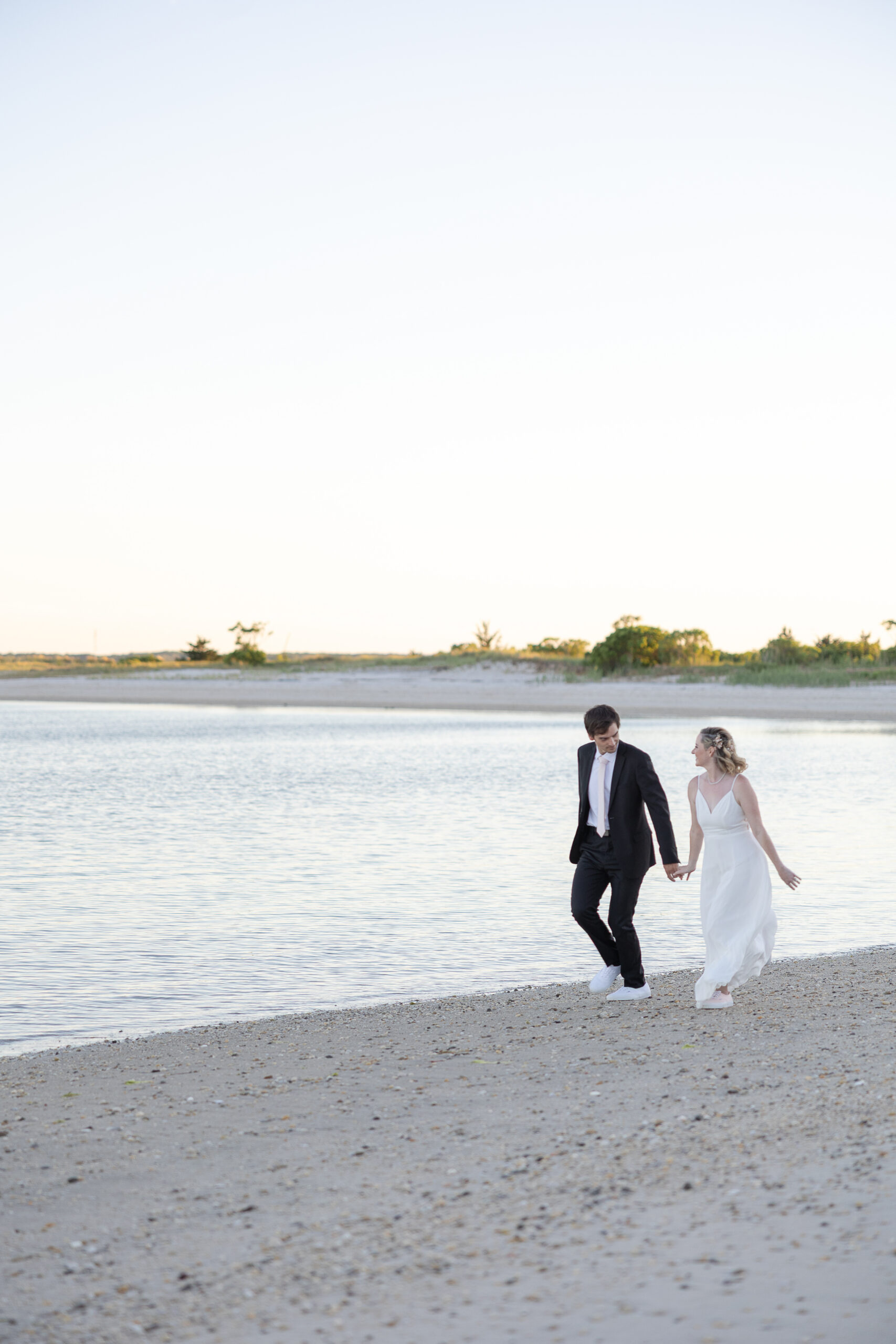 Bride and groom outdoor sunset wedding portraits 
