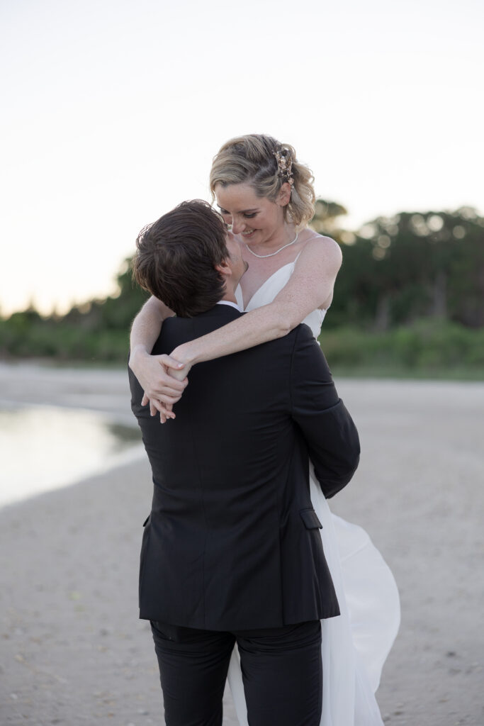 Bride and groom outdoor sunset wedding portraits