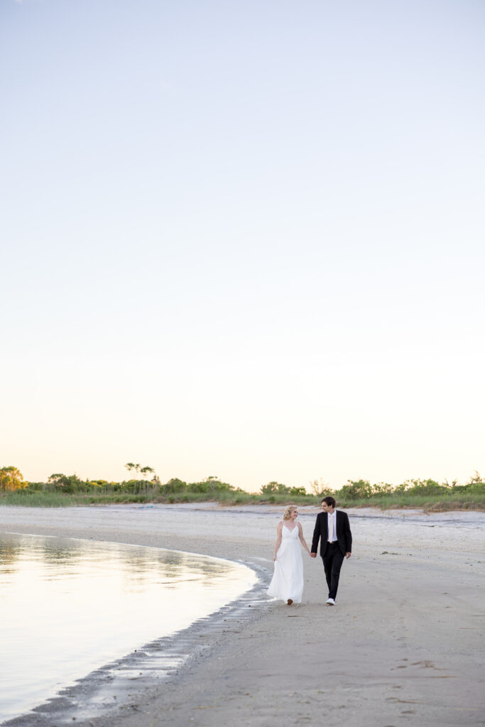 Bride and groom outdoor sunset wedding portraits 