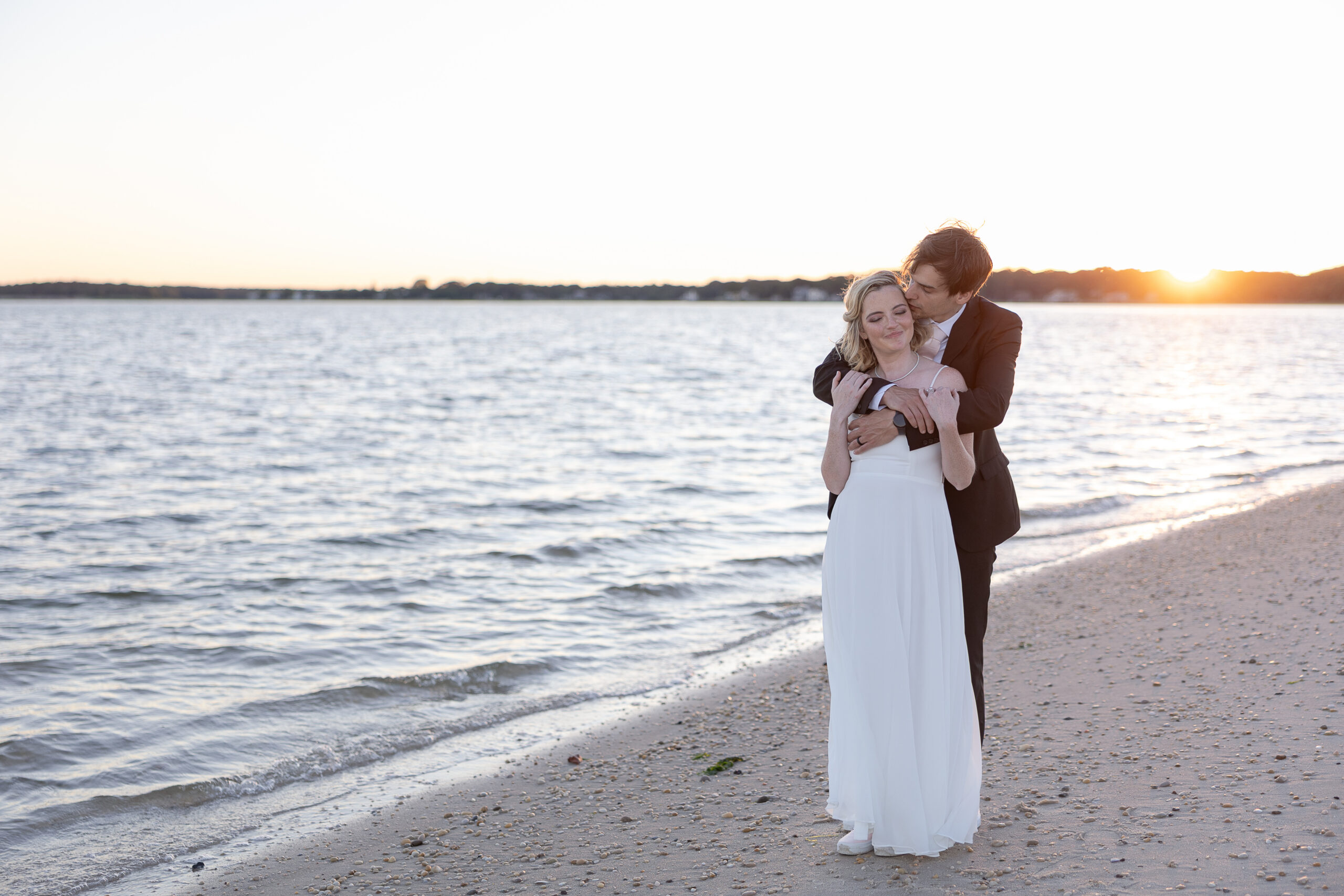 Bride and groom outdoor sunset wedding portraits 