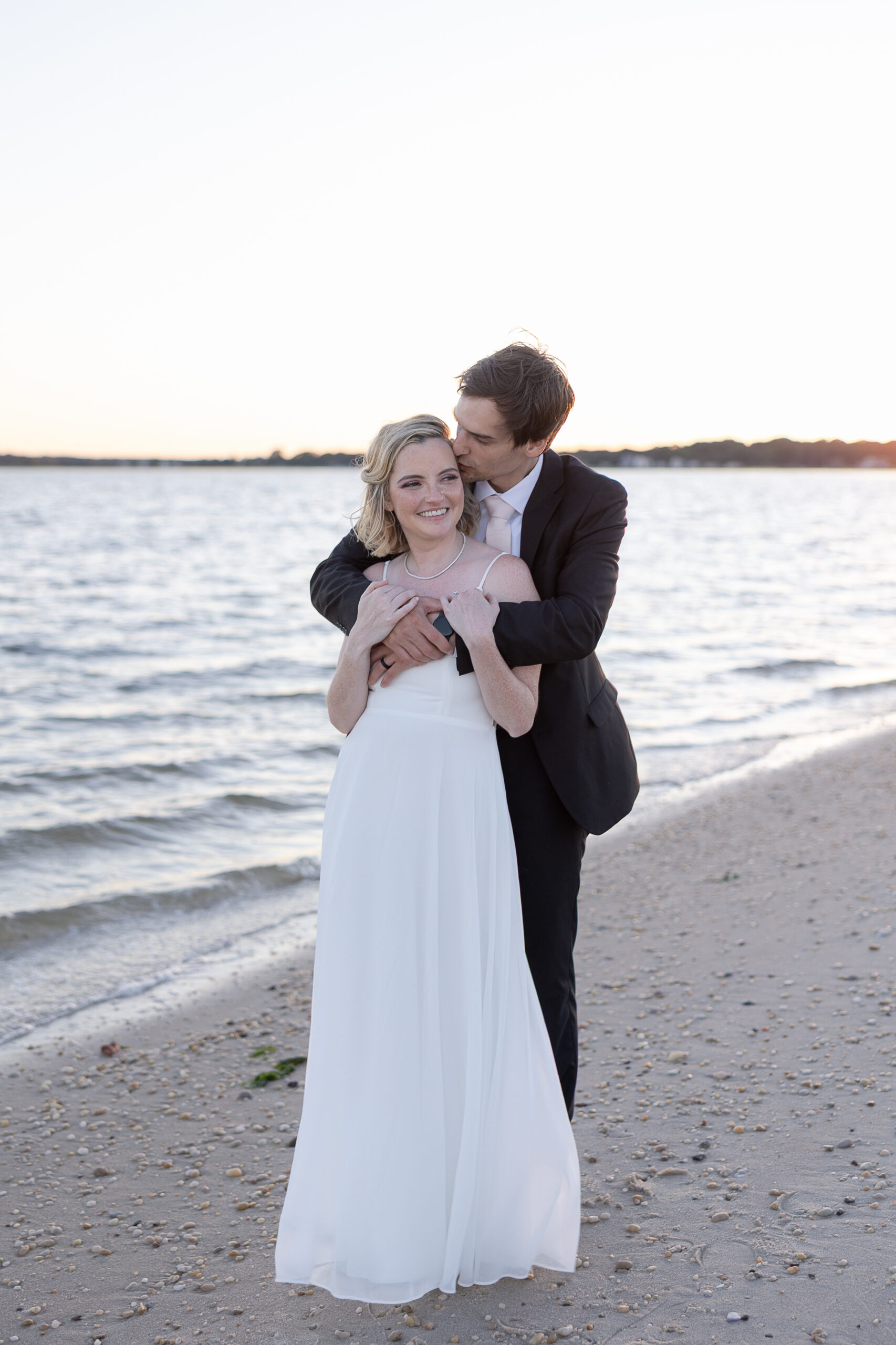 Bride and groom outdoor sunset wedding portraits 