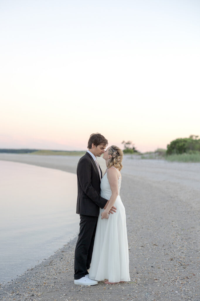 Bride and groom outdoor sunset wedding portraits