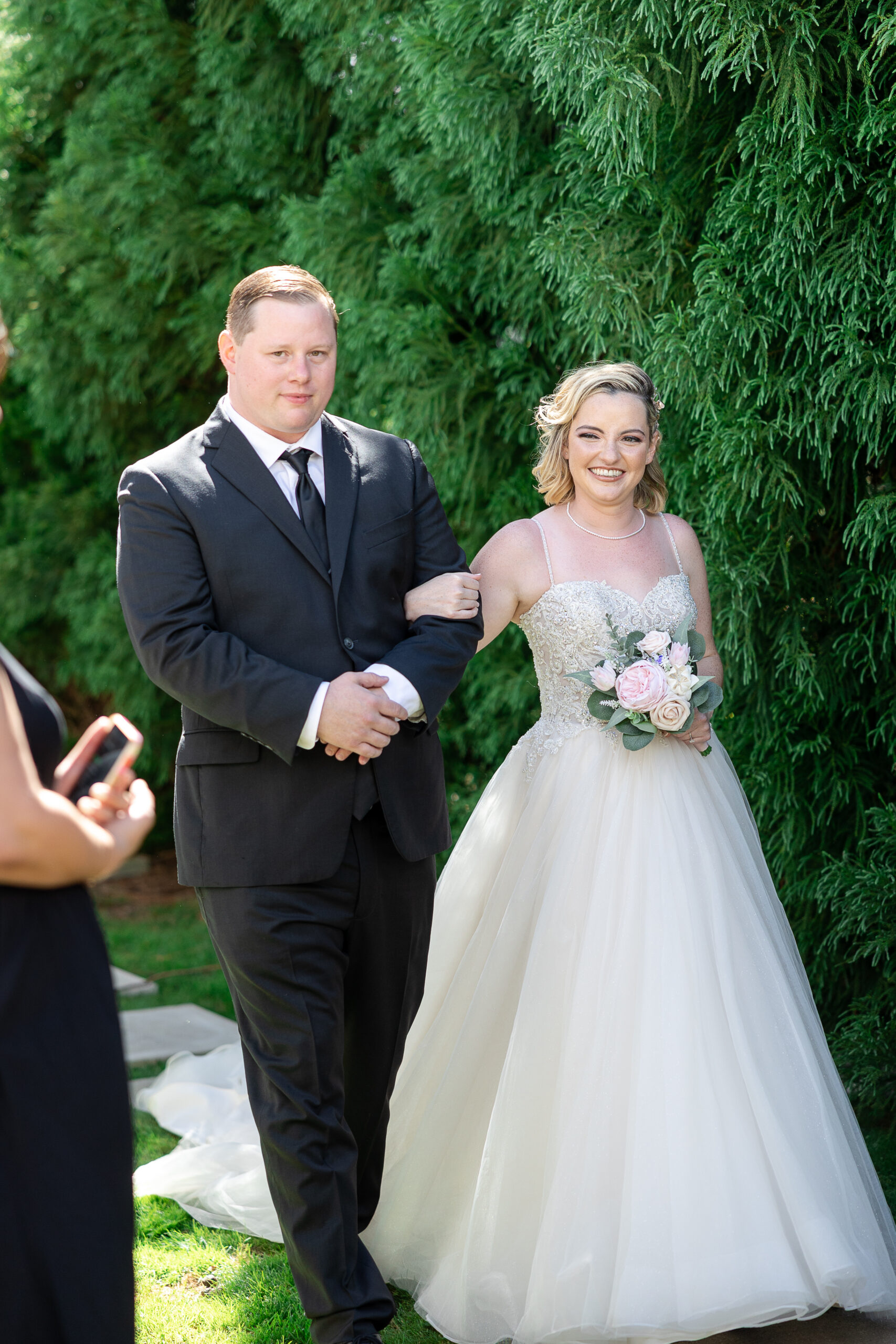Bride walking in for Long Island wedding day
