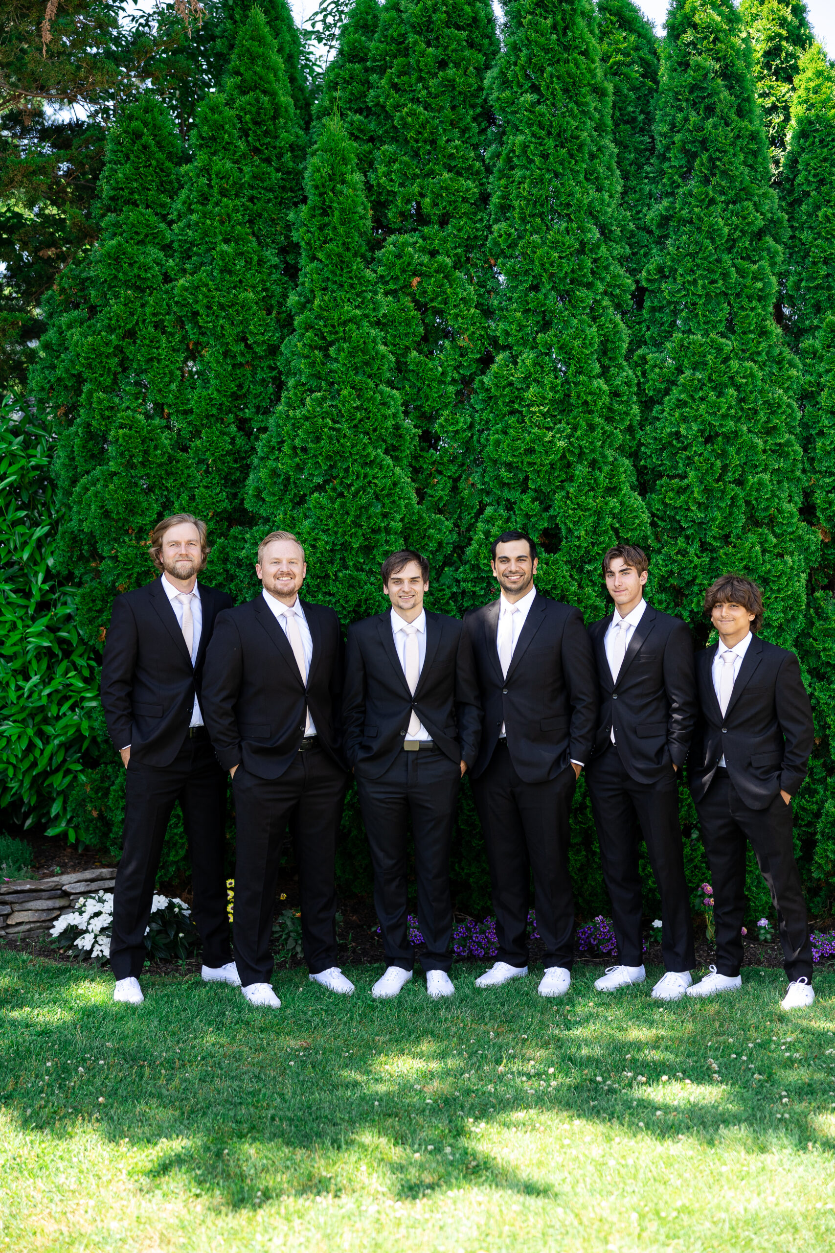 Groomsmen wedding party at beach wedding day