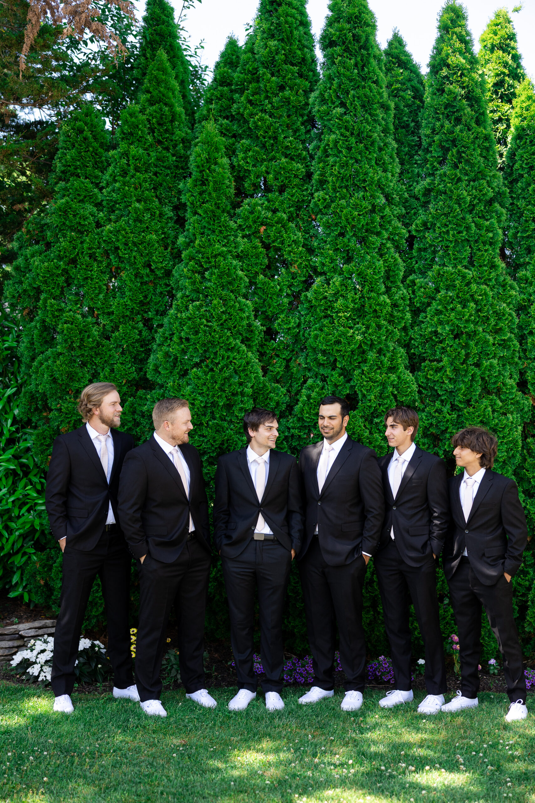 Groomsmen wedding party at beach wedding day